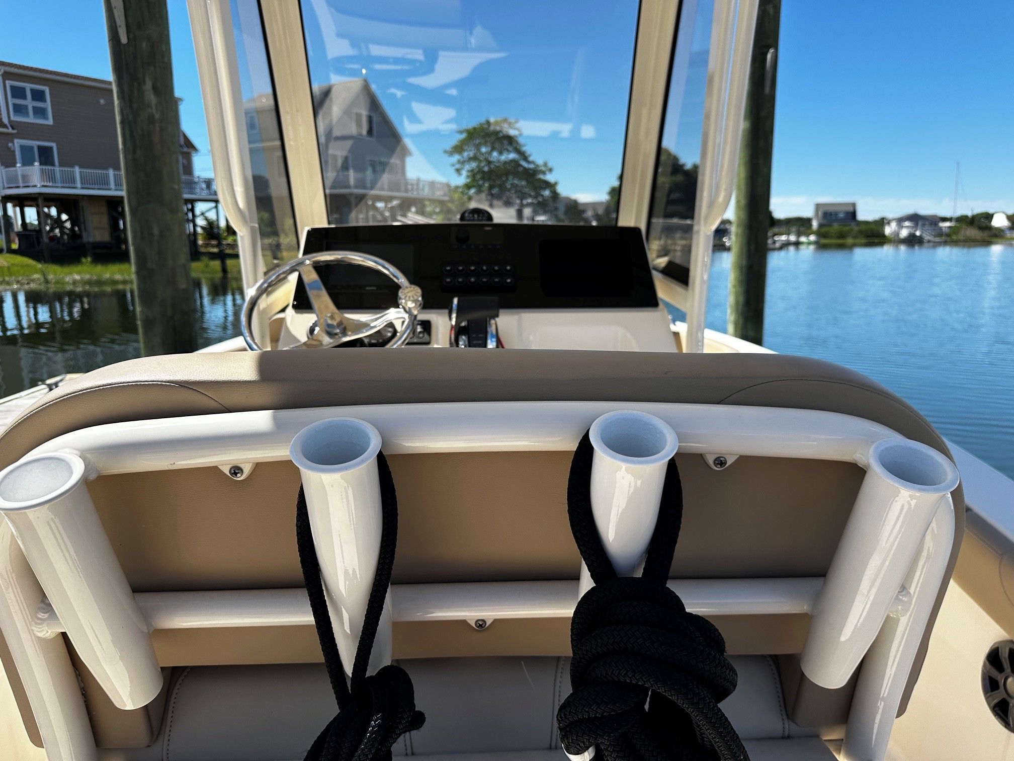 Interior view of a 2022 Scout 210XSF boat at the dock.