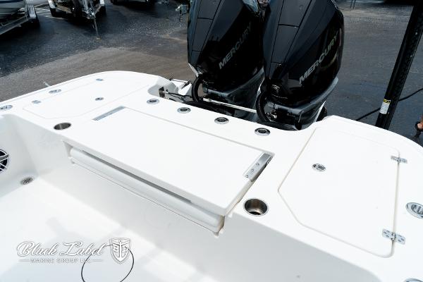 2025 Caymas 281 HB boat with dual Mercury engines, featuring a spacious deck layout.