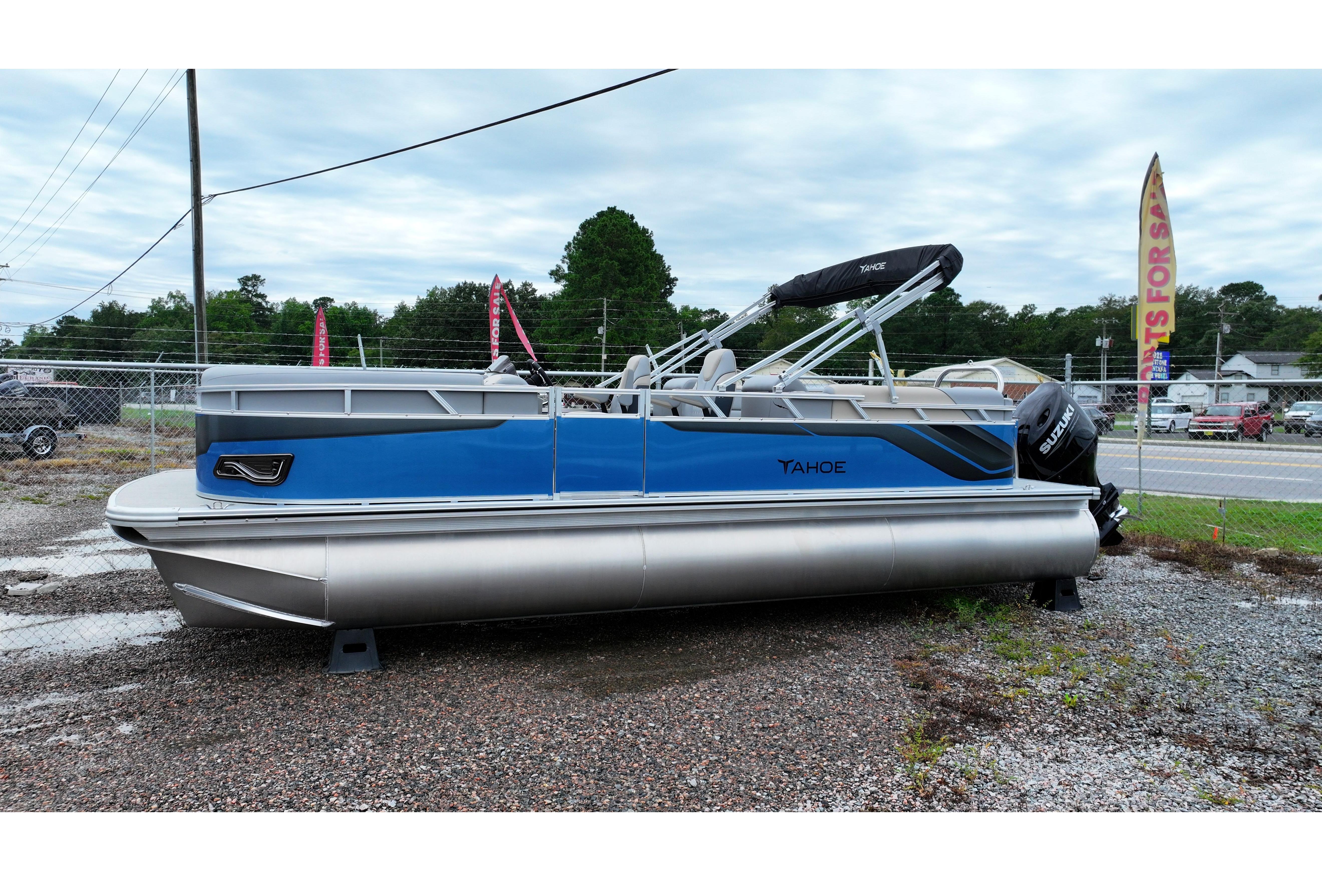 2026 Tahoe Pontoon Sport 85 Quad Lounger, blue and silver, parked outdoors.