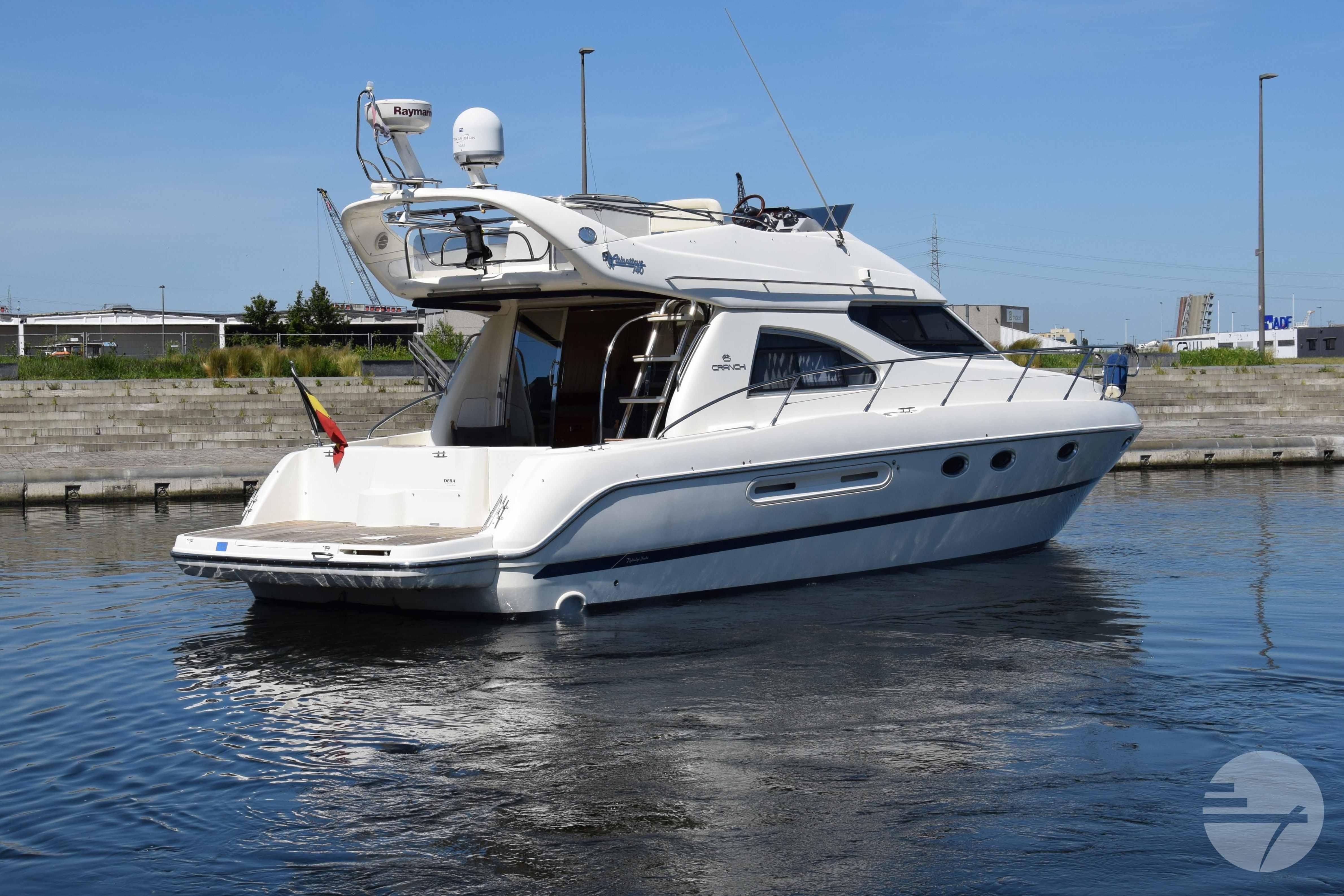 2007 Cranchi Atlantique 40 yacht docked in a marina, showcasing sleek design and luxury features.