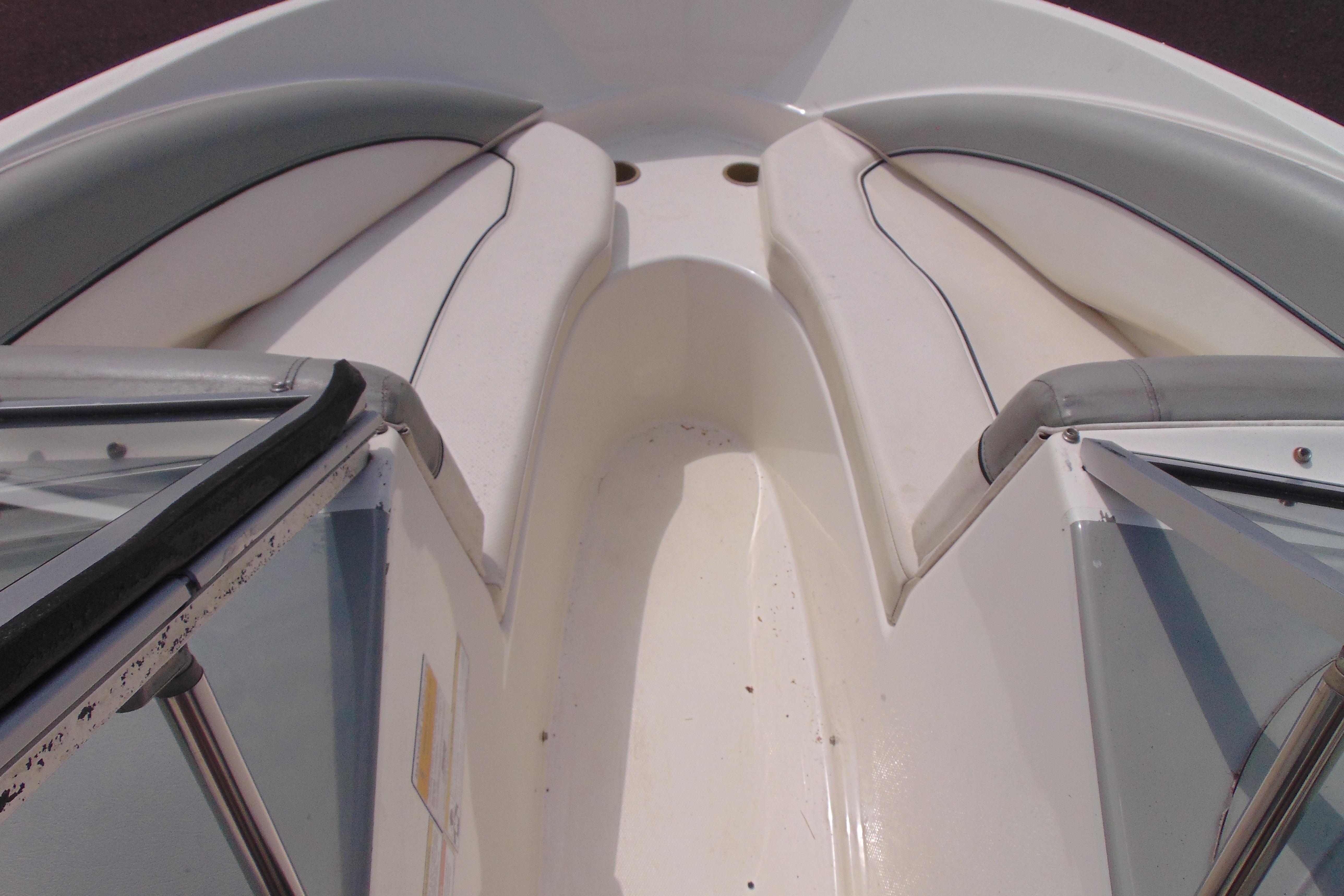 2012 Bayliner 185 Bowrider interior with white and gray seating.