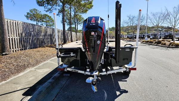 2025 Mako 18 Pro Skiff Backwater Edition boat on trailer, rear view.