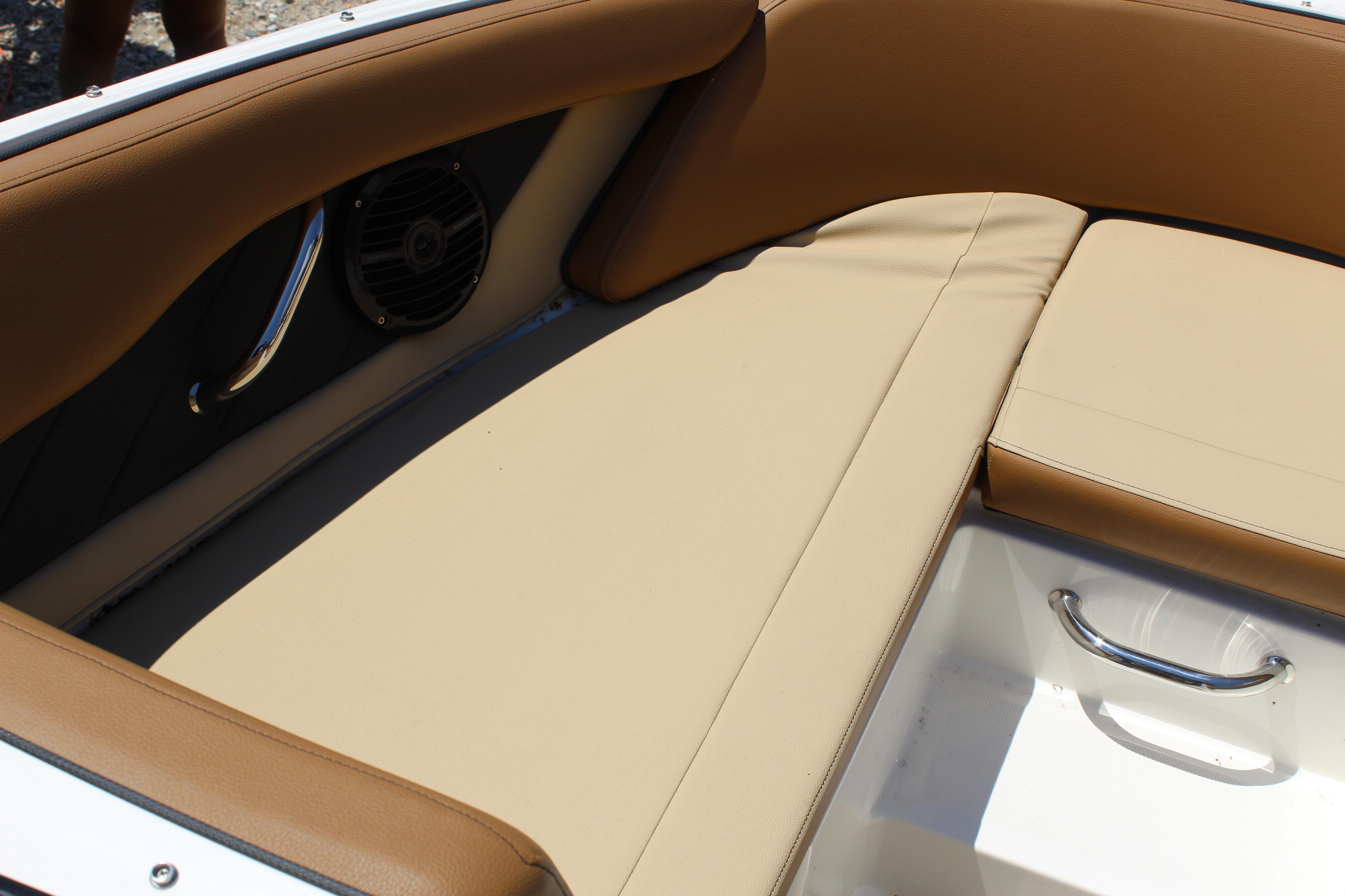 2018 Sea Ray SPX 190 Outboard boat interior with tan seating and stainless steel accents.
