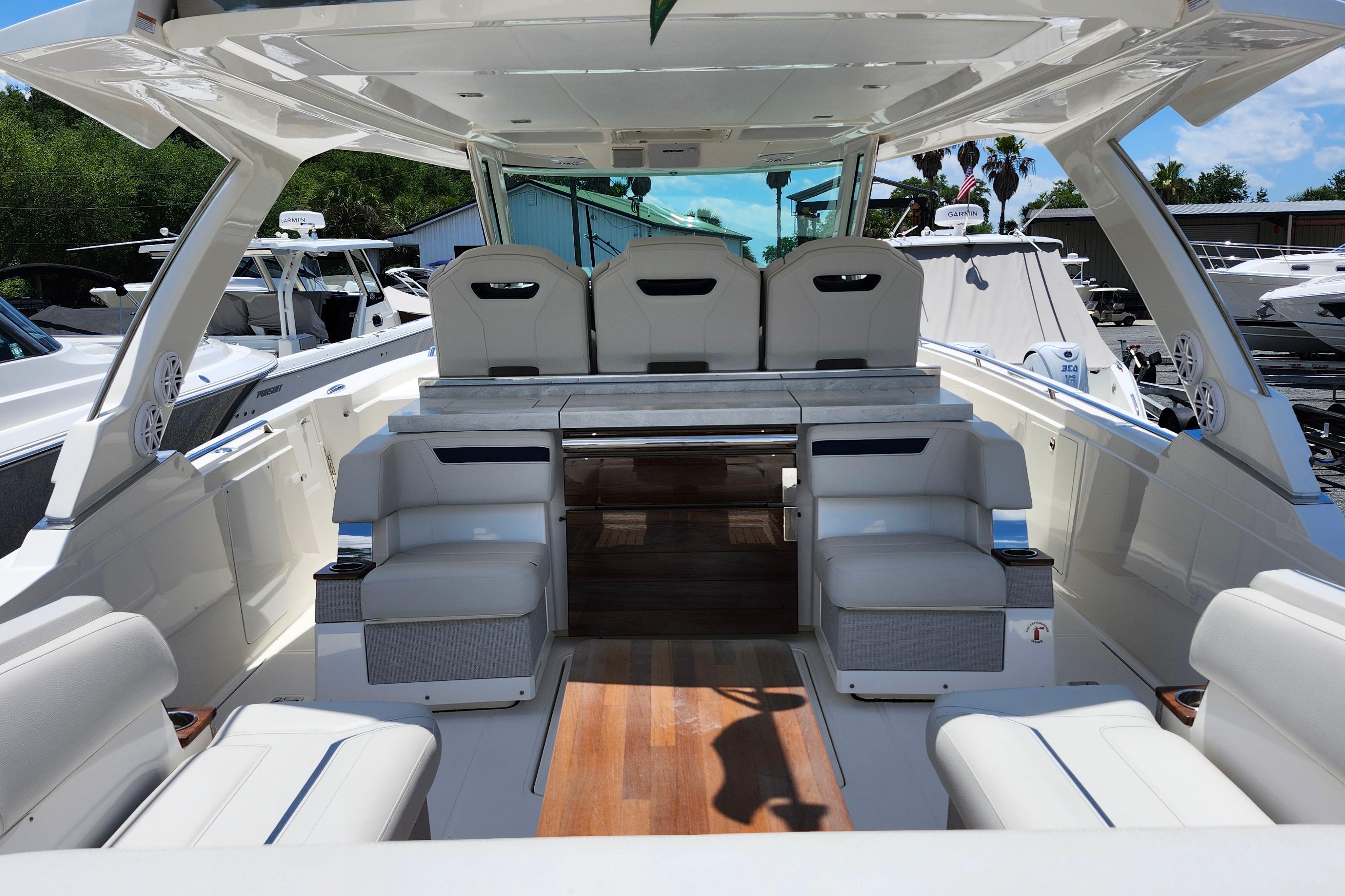 2022 Tiara Yachts 38 LS luxury boat interior with sleek seating and modern design.
