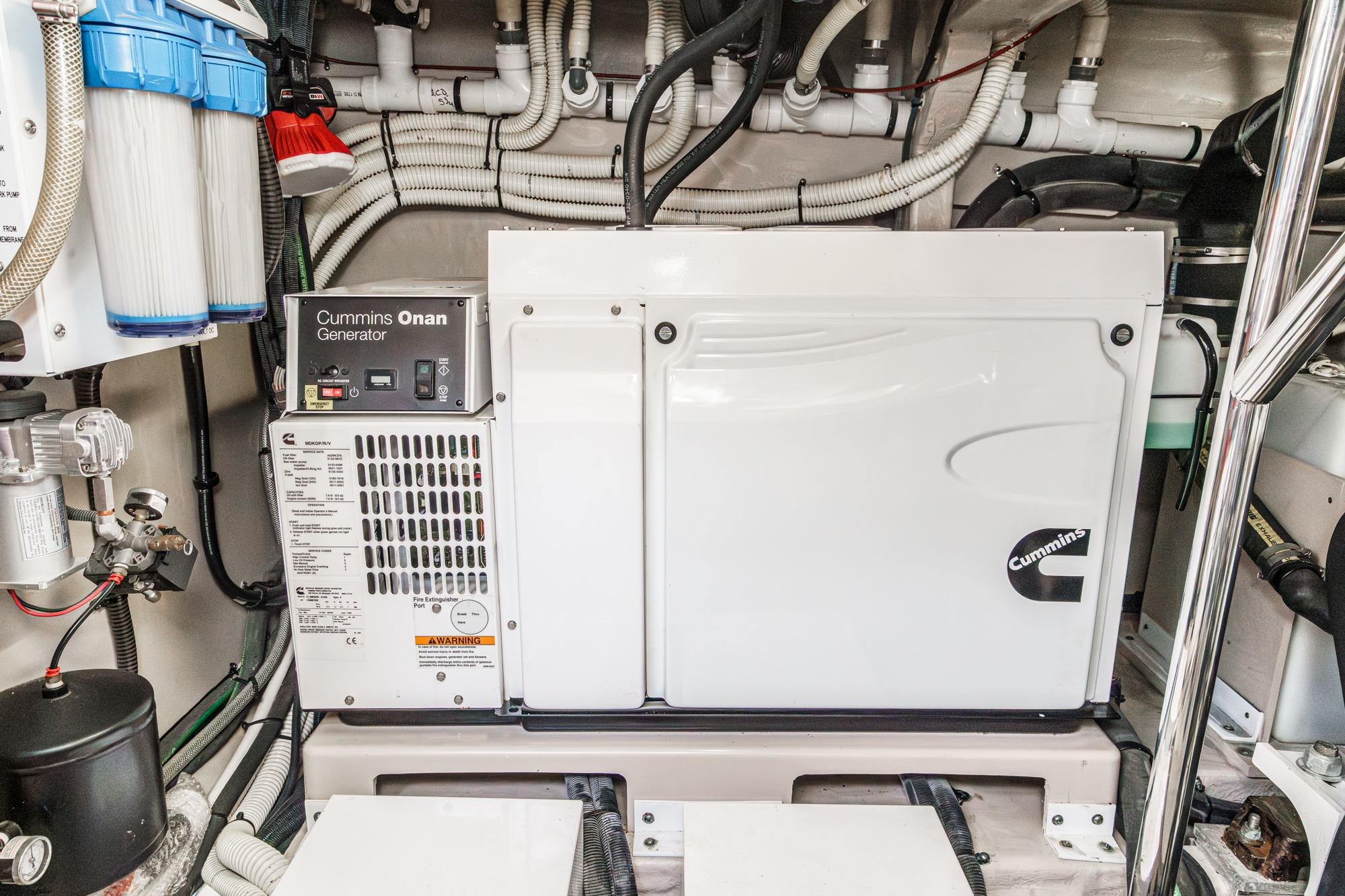 Cummins Onan generator in 2016 Sea Ray L590 yacht engine room.