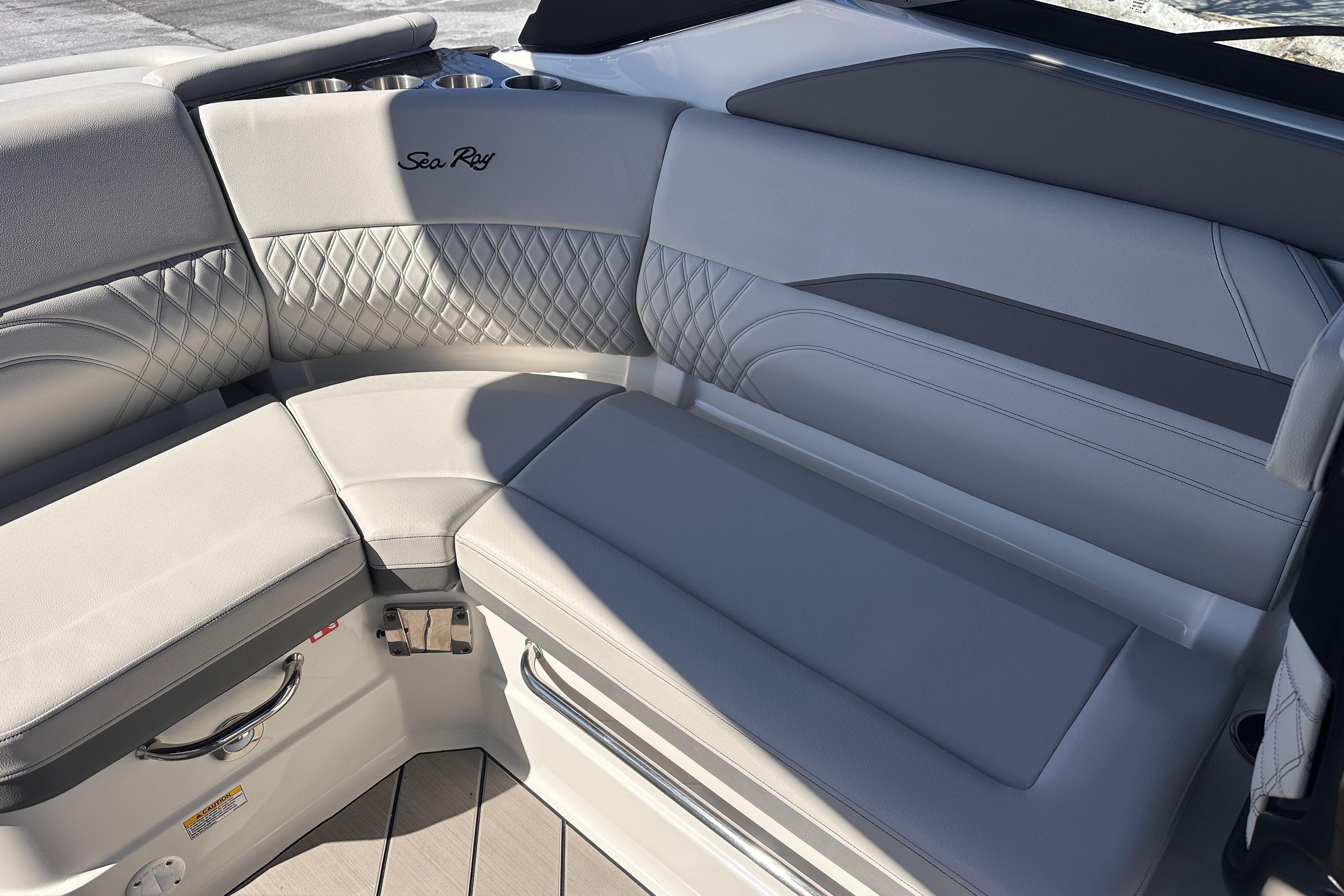 Luxurious seating on 2026 Sea Ray SLX 260 Outboard boat with elegant upholstery design.