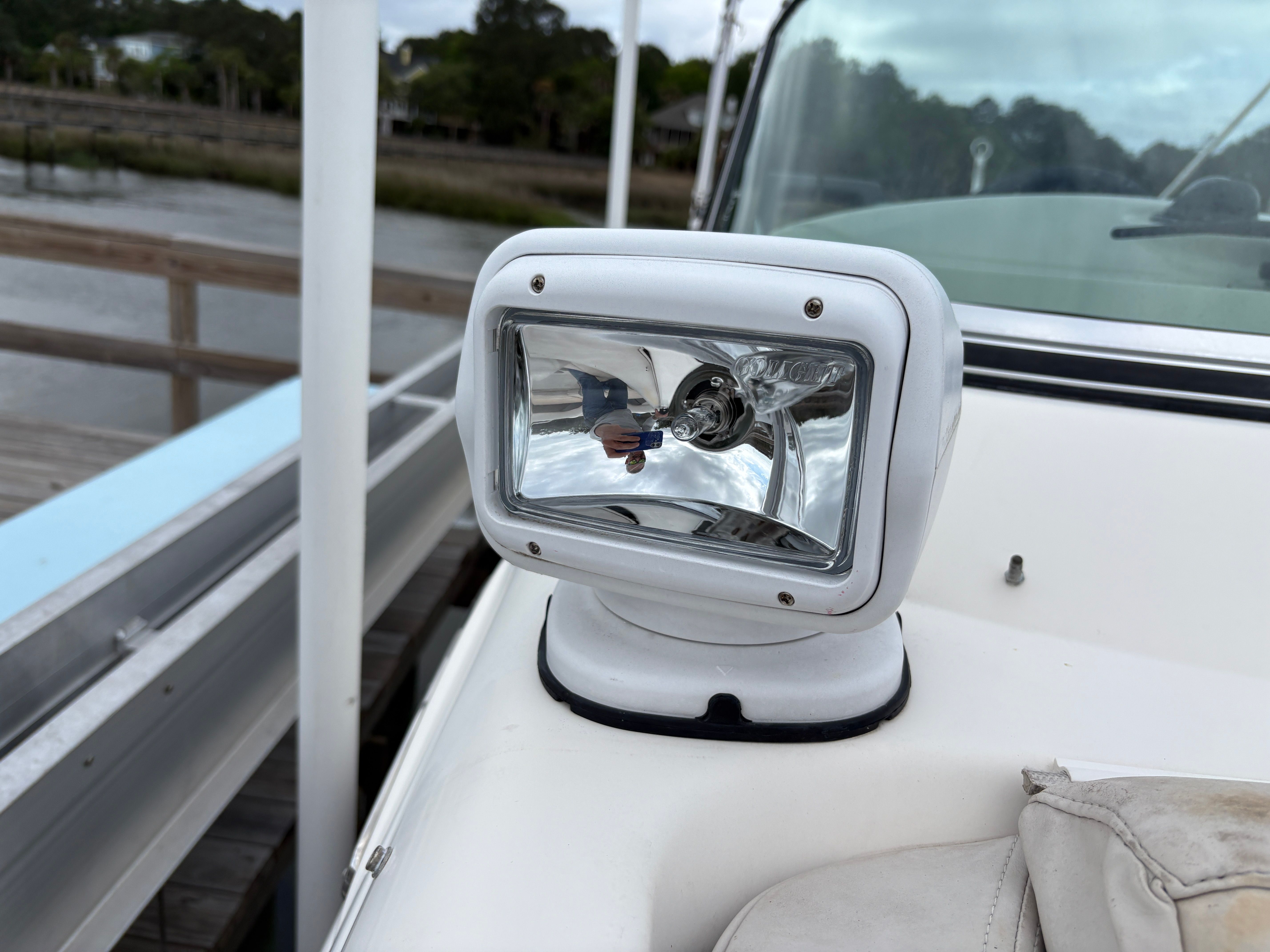 Close-up of a spotlight on a 2009 Hurricane SUN DECK 260 boat.