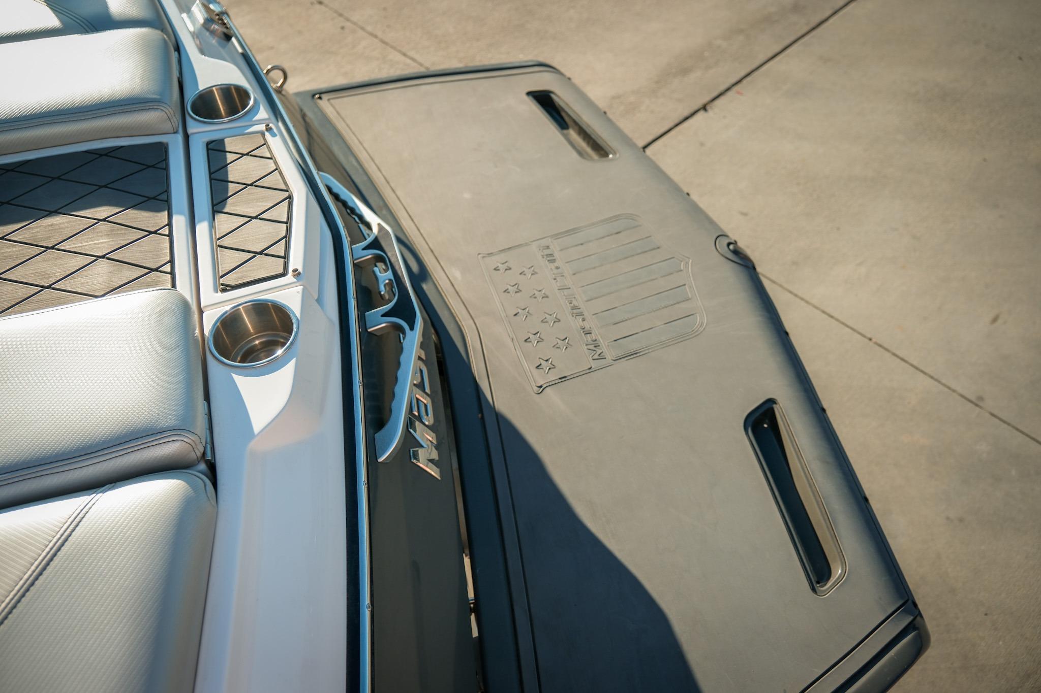 2013 MasterCraft X-2 boat interior with cup holders and swim platform.