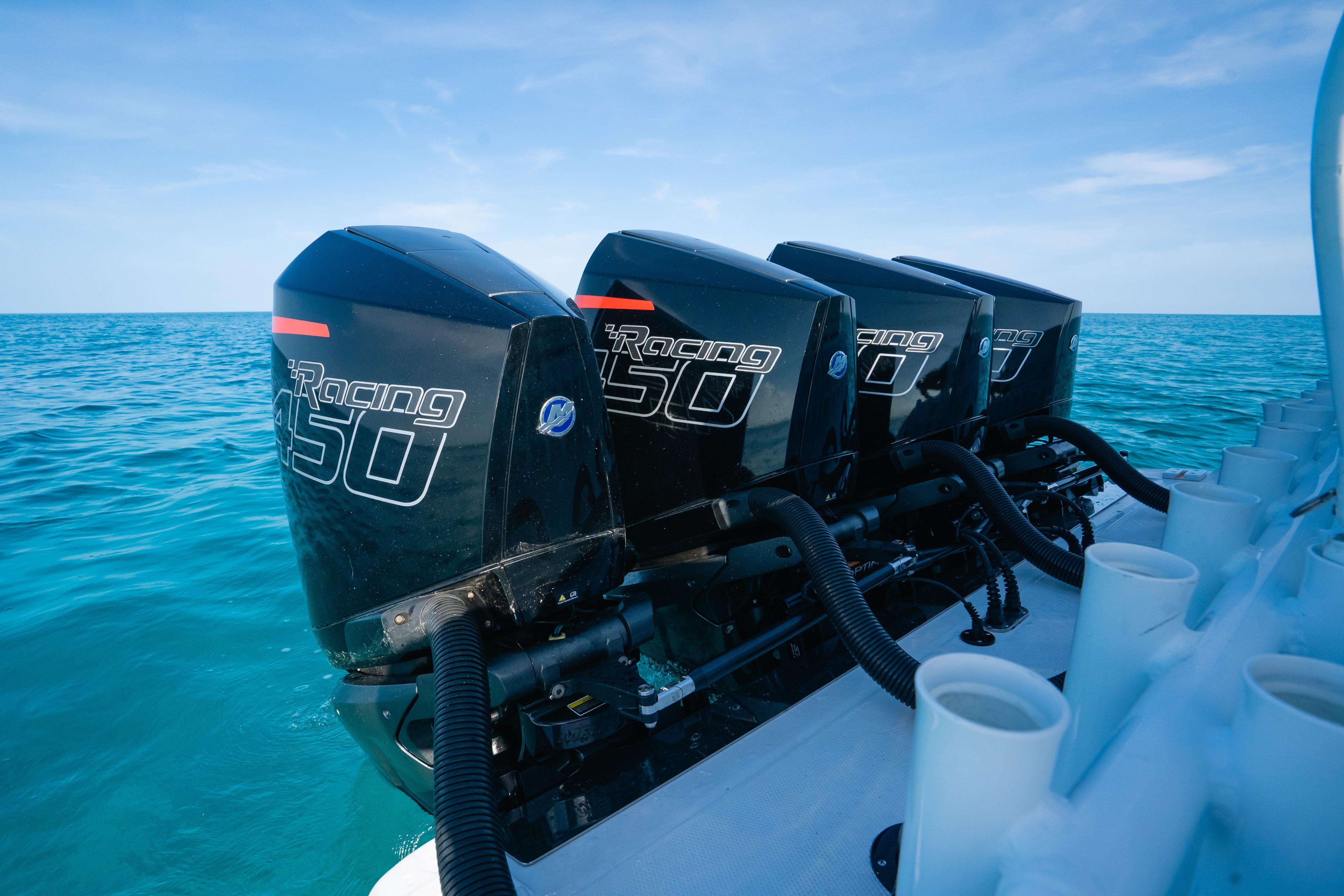 2022 Nor-Tech 392 Super Fish with four powerful outboard engines on open water.