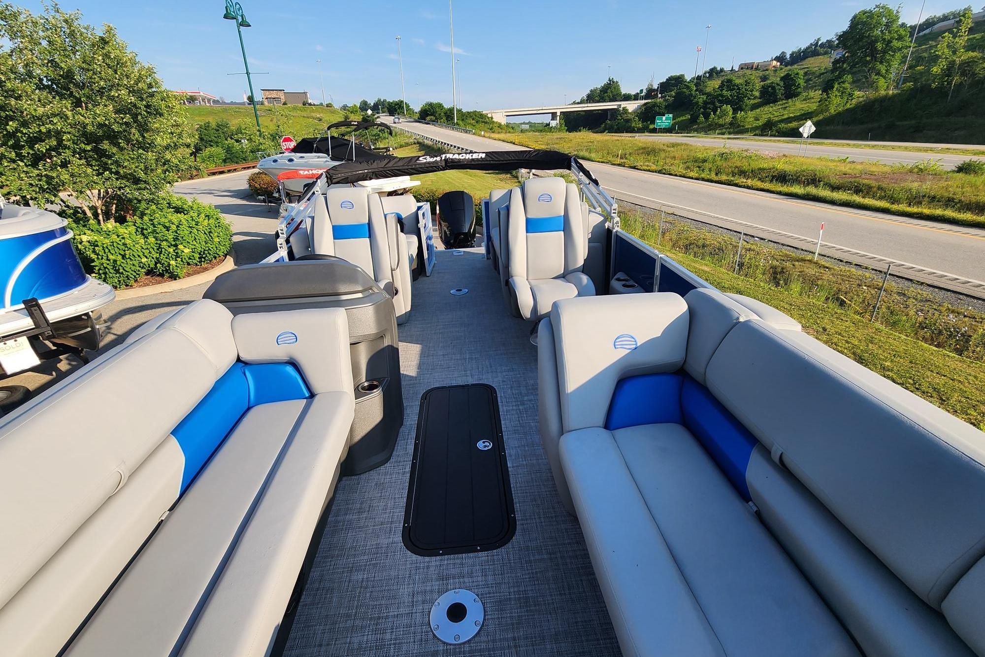 2026 Sun Tracker Party Barge 22 XP3 pontoon boat with spacious seating and modern design.