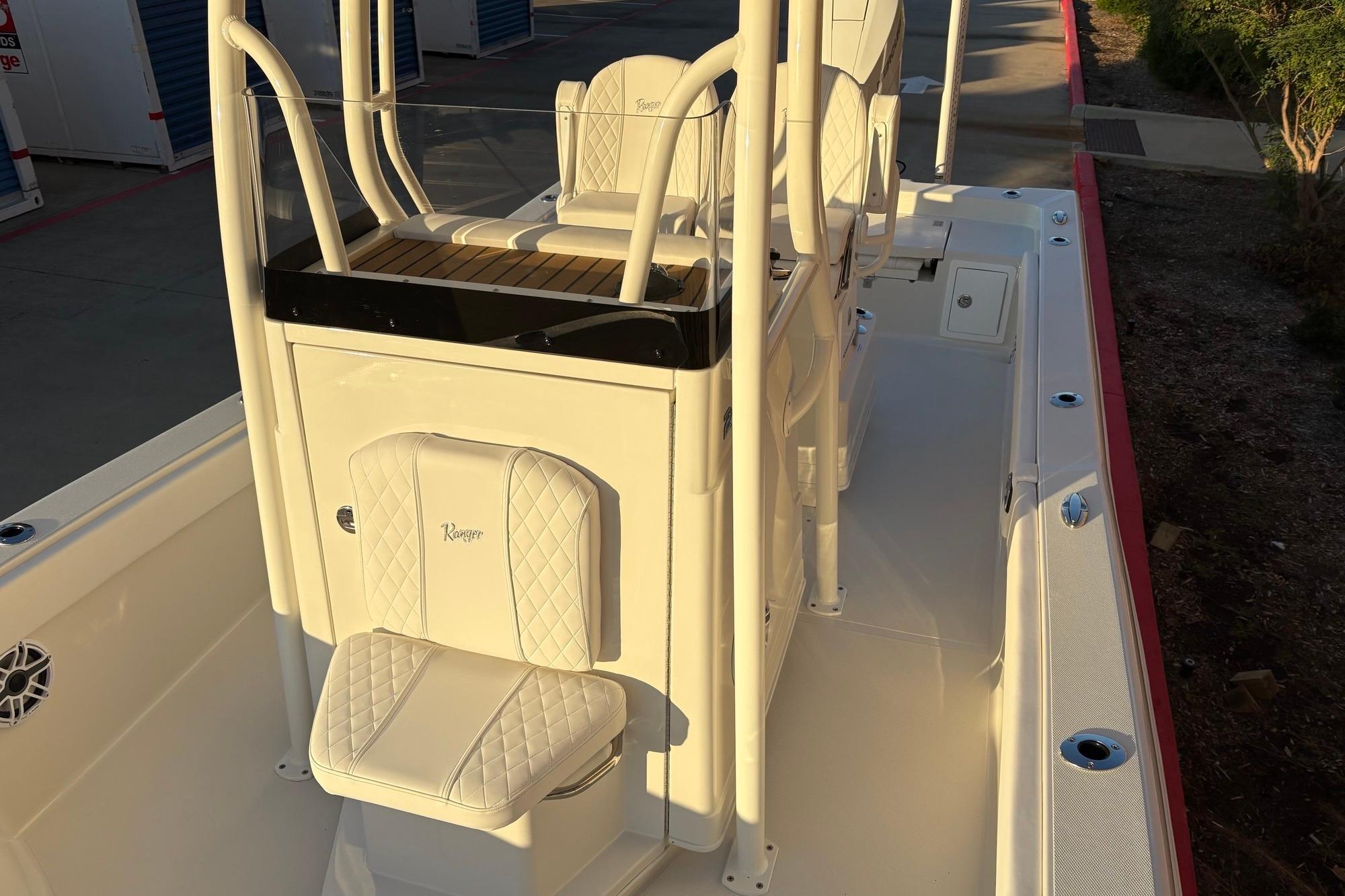 2026 Ranger 2660 Bay boat interior with white seating and console.