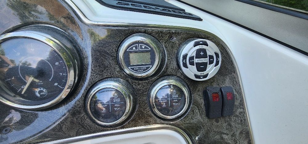 Dashboard of a 2007 Sea-Doo sport boat with various gauges and controls.