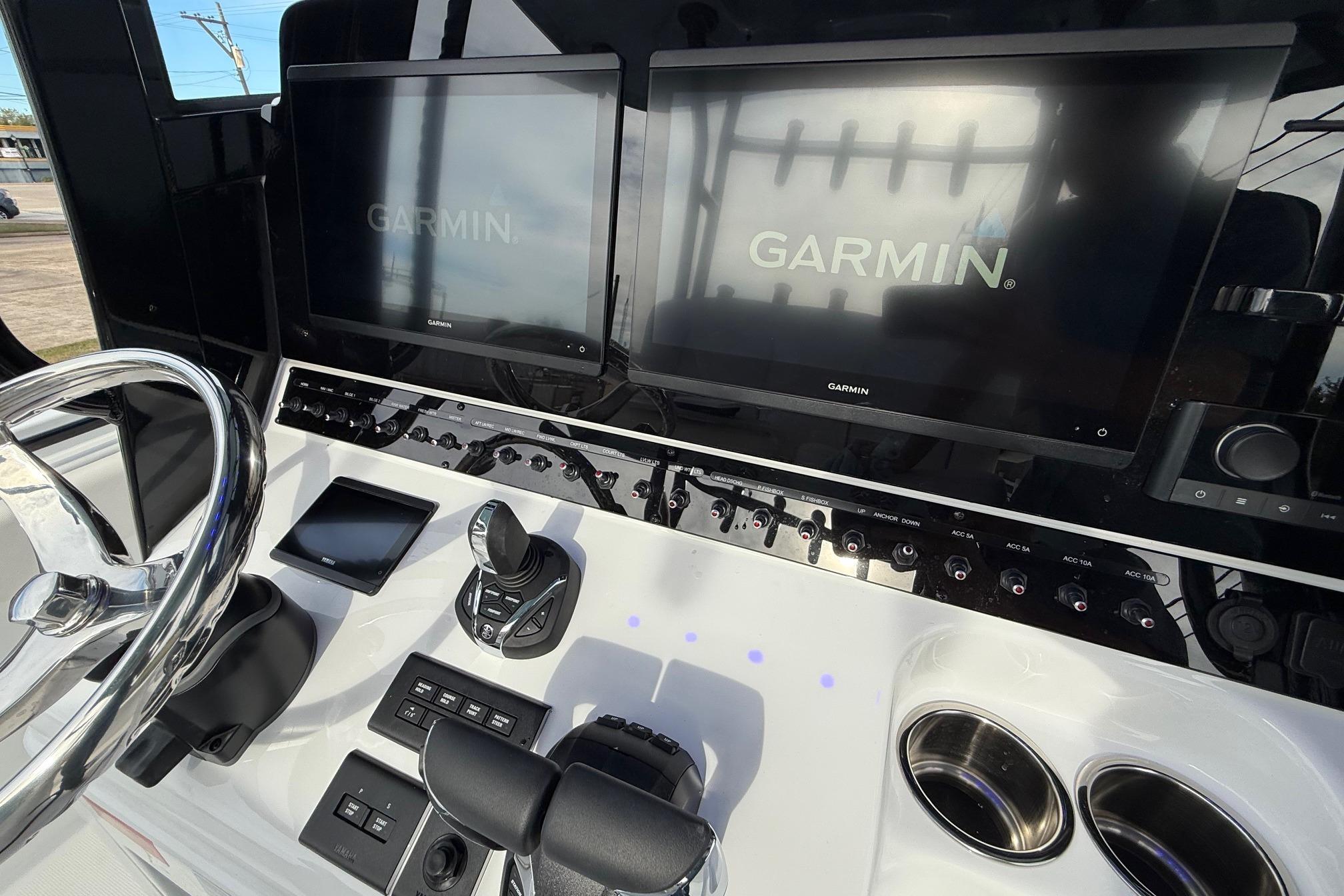 Control panel of 2026 Sea Hunt Gamefish 30 Coffin Box with Garmin displays.