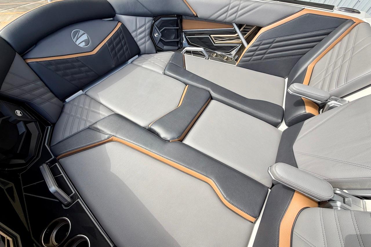 Luxurious interior of 2025 Tigé Ultré 25ZX boat with sleek, modern seating design.