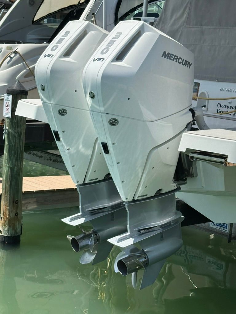 2024 Beneteau Gran Turismo 32 with Mercury V10 engines at dock.