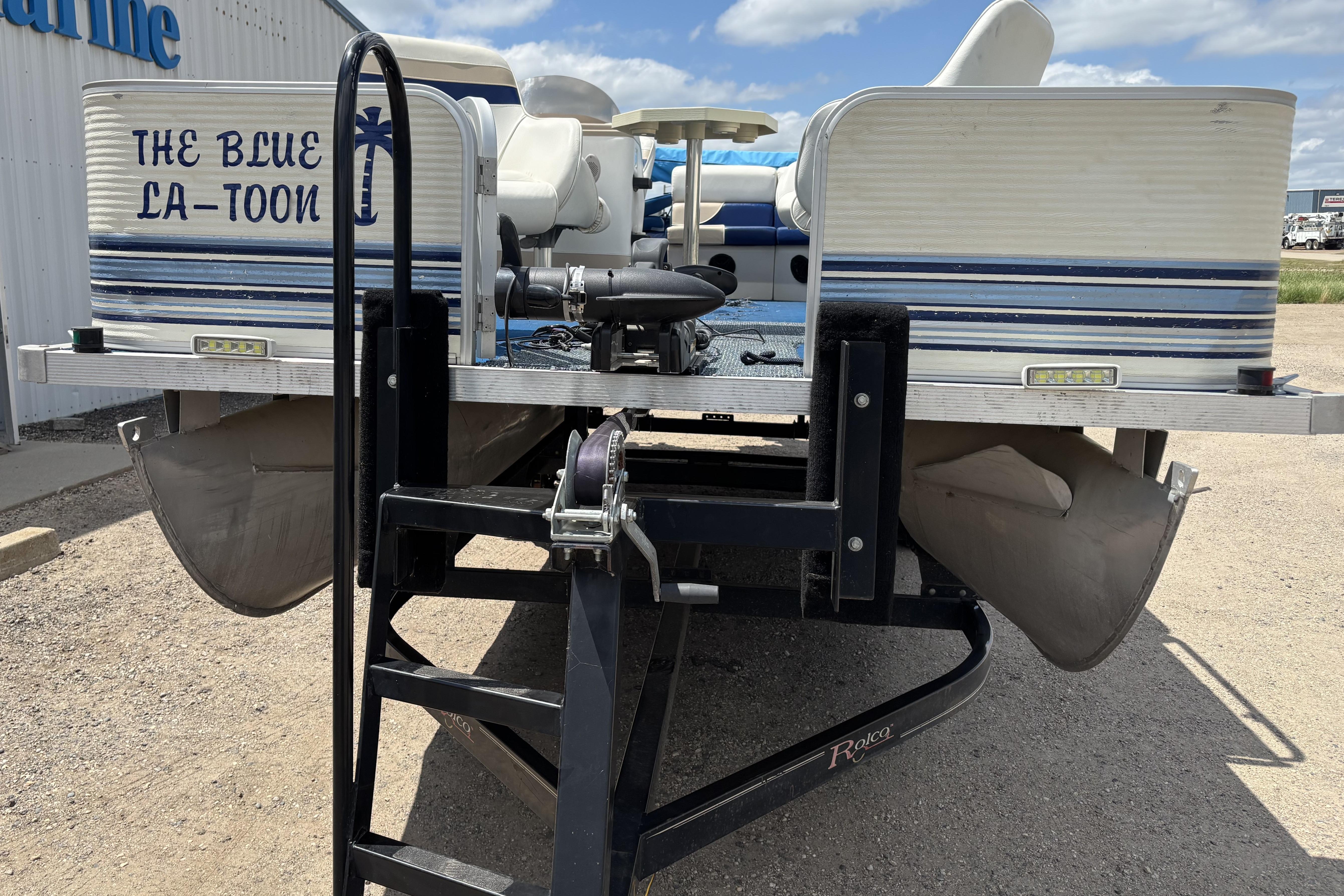 1997 Northwood 24' Pontoon boat on trailer, labeled "The Blue La-Toon."