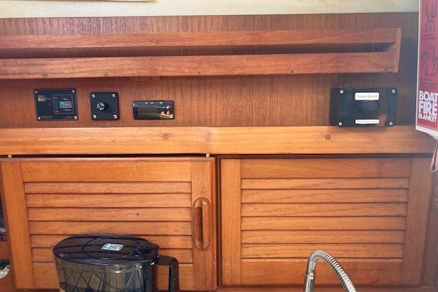 Interior of 1988 Westerly Corsair 36 yacht with wooden cabinetry and appliances.