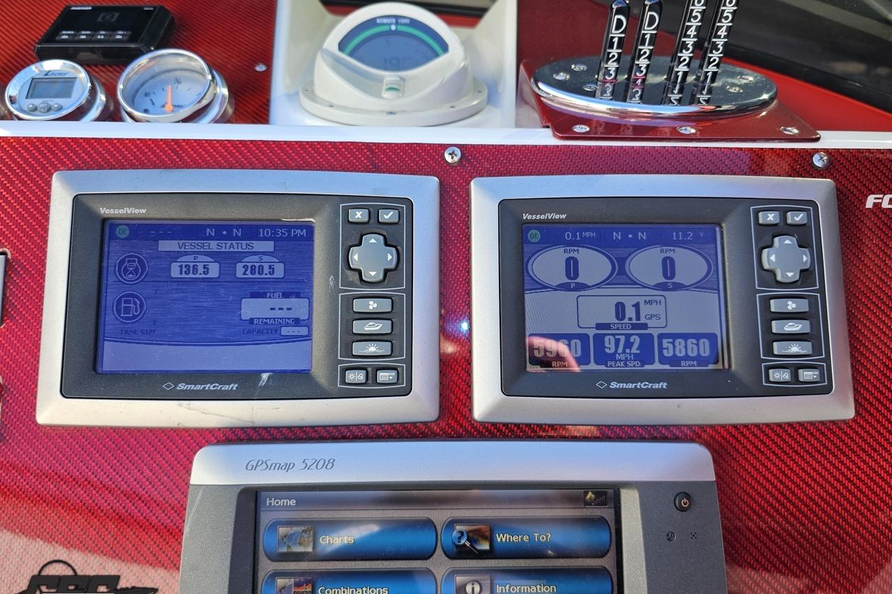 Dashboard of a 2009 Fountain 47 Lightning boat with SmartCraft displays.