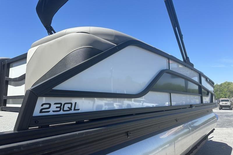 2026 Evotti 523QL pontoon boat side view under clear blue sky.