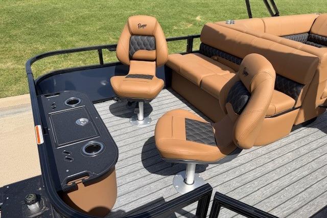 2026 Ranger 223F boat interior with tan seating and fishing station.