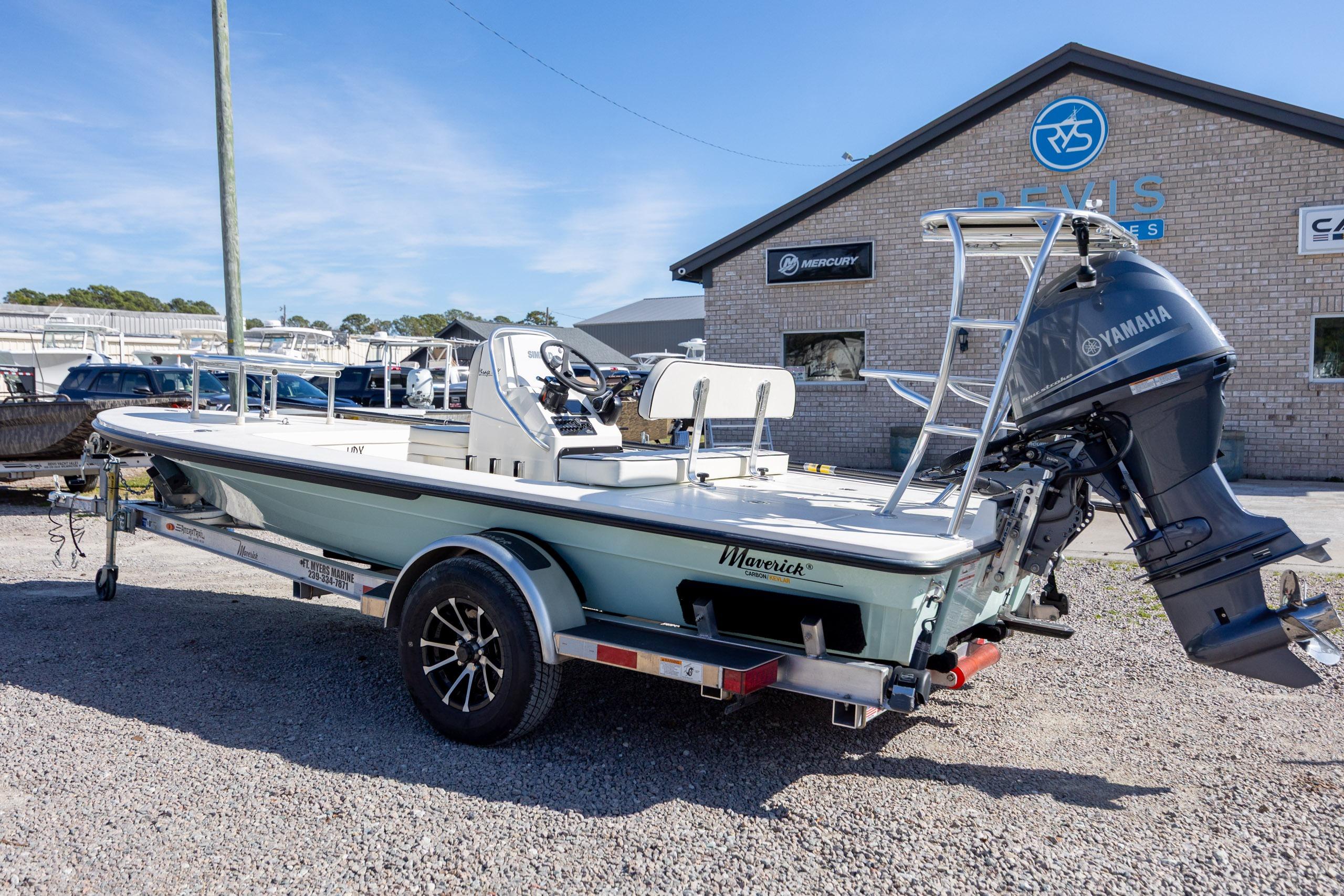 2024 Maverick 17 HPX-S boat with Yamaha engine on trailer, parked outside dealership.