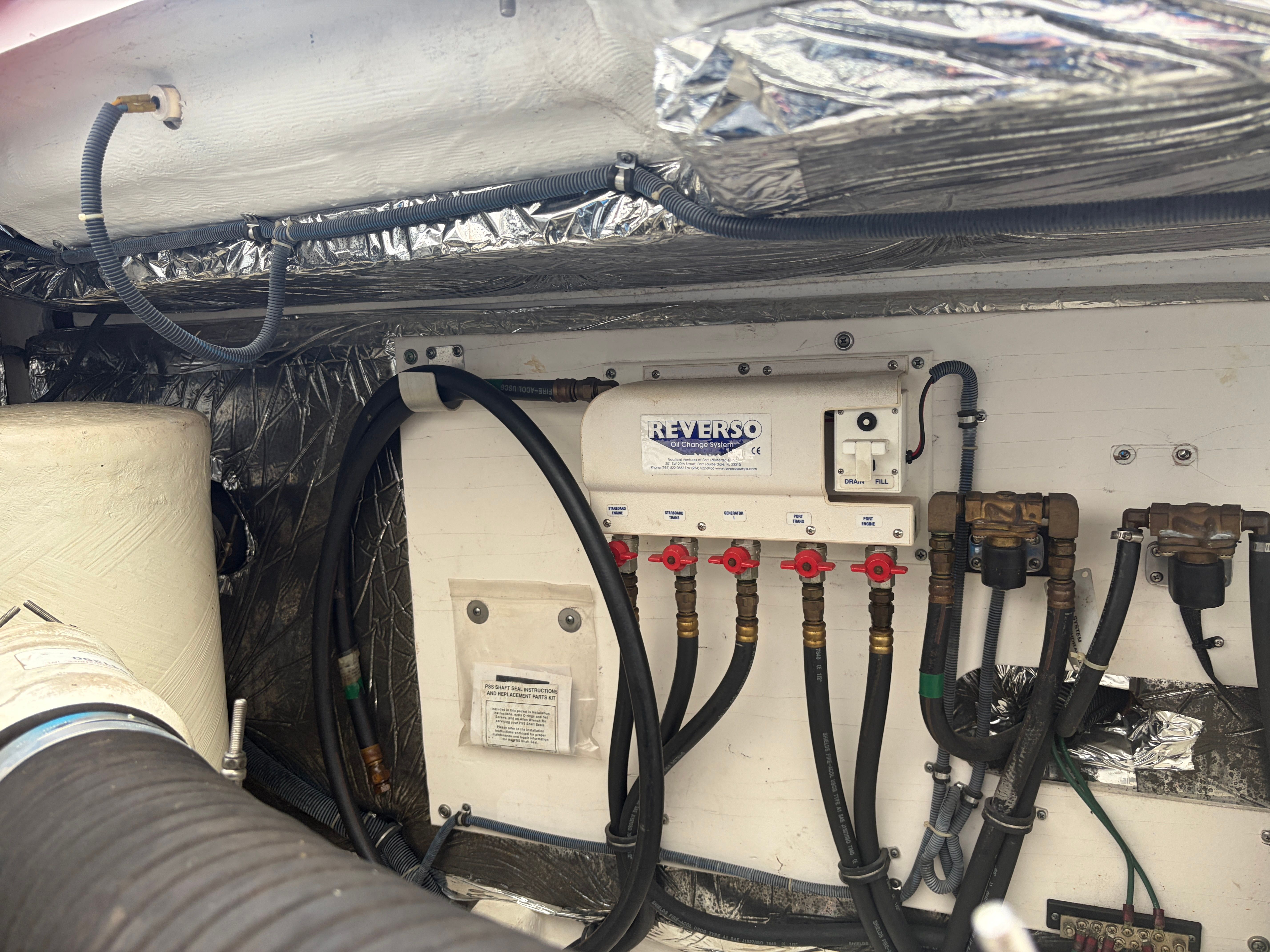 Engine room of 2005 Tiara Yachts Sovran with Reverso oil change system.