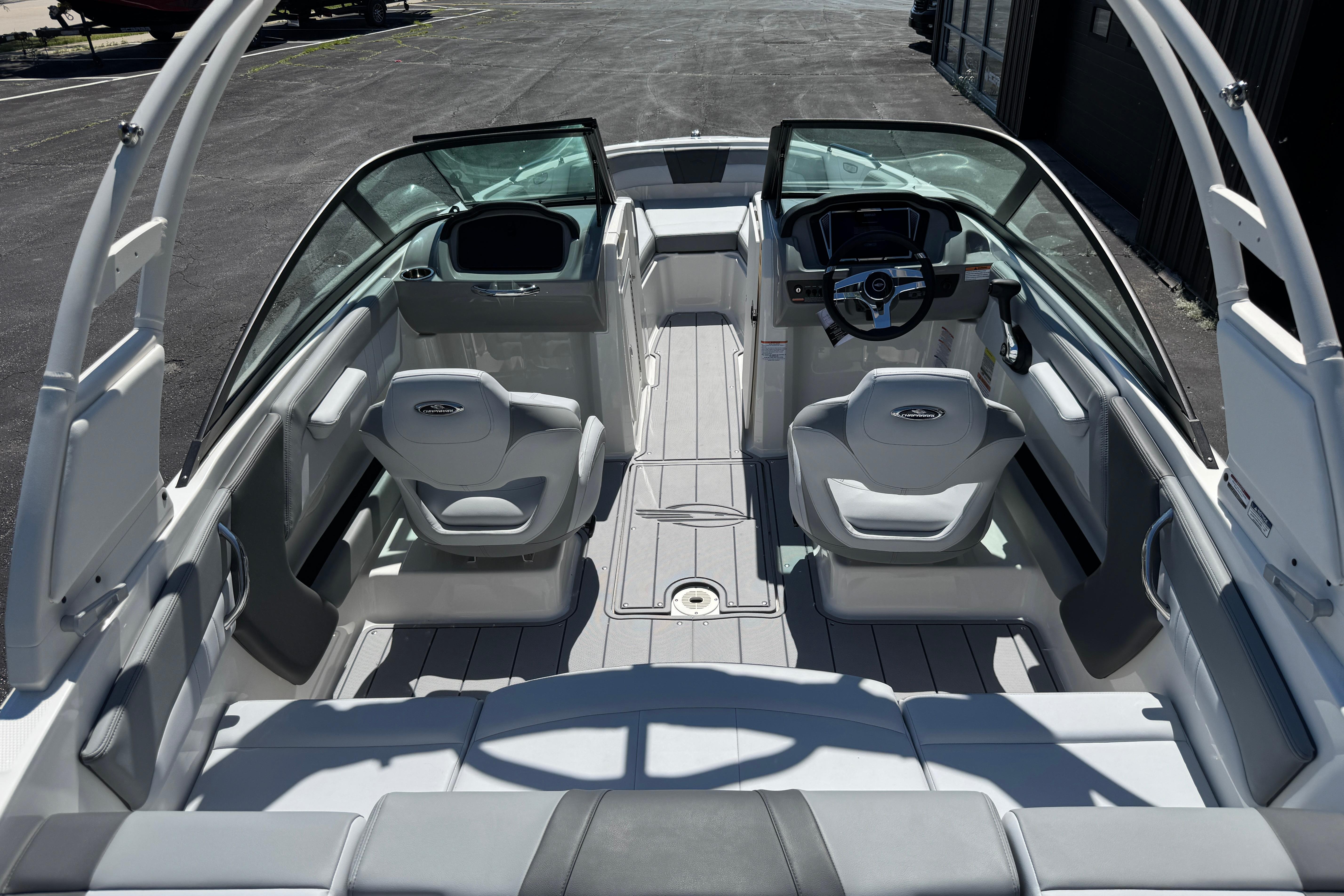 2026 Chaparral 21 SSi boat interior with modern seating and sleek dashboard design.