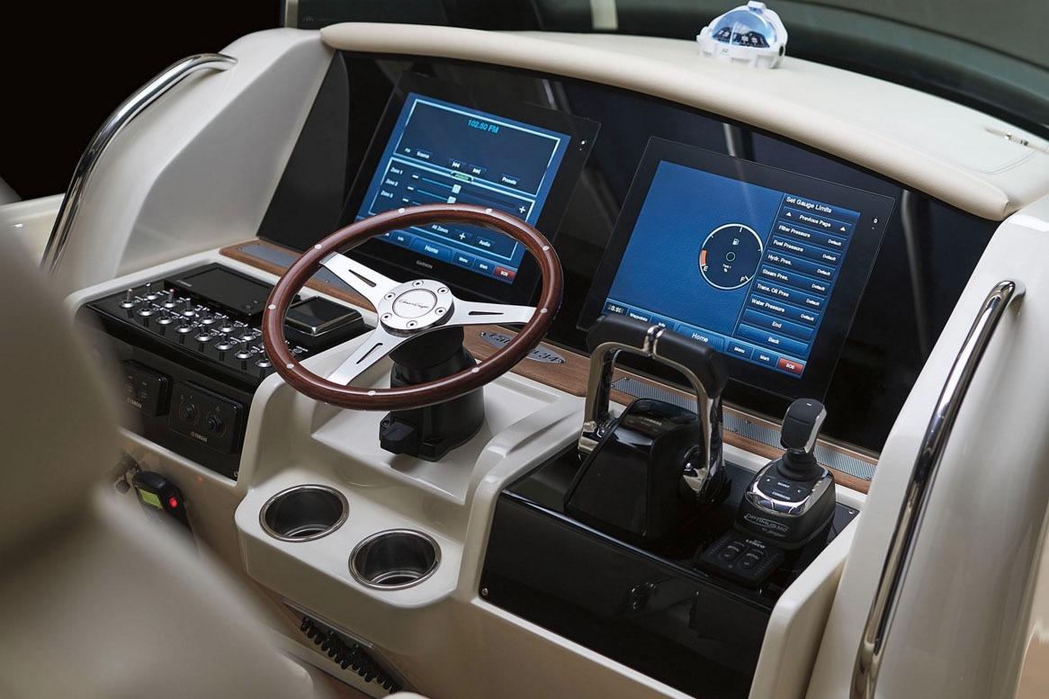 Manufacturer Provided Image: 2018 Chris-Craft Catalina 34 helm with dual navigation screens and modern controls.