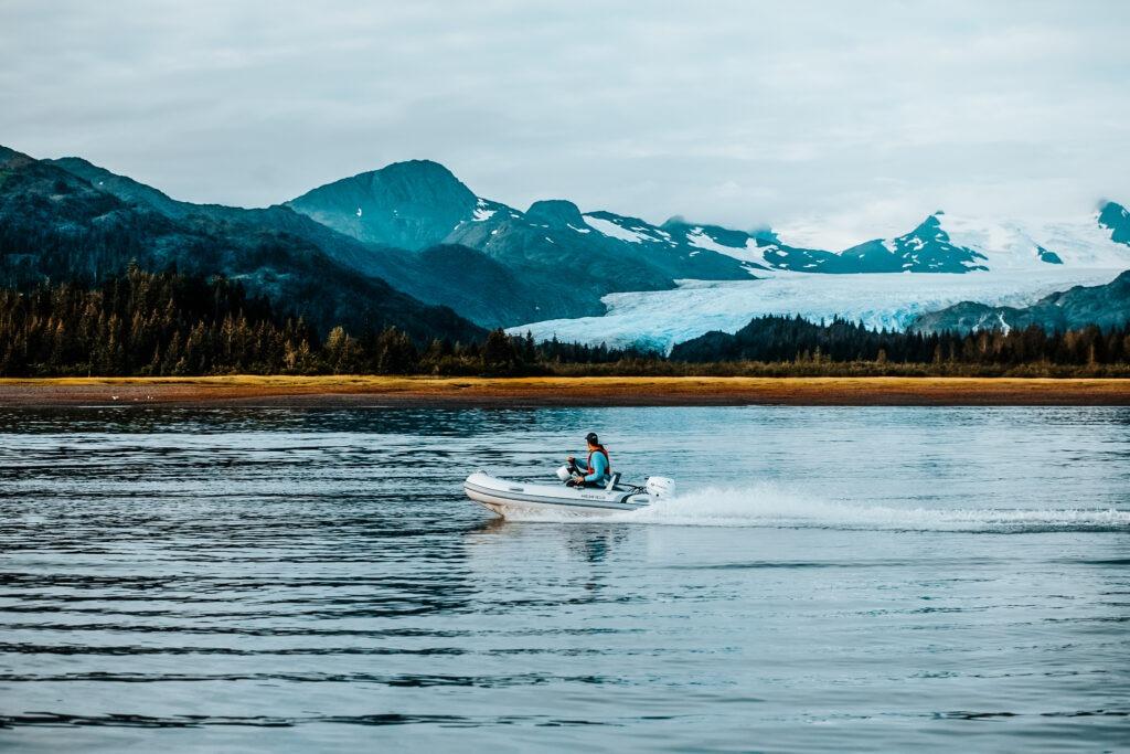 Highfield Classic 340 boat on water with mountain backdrop, 2026.