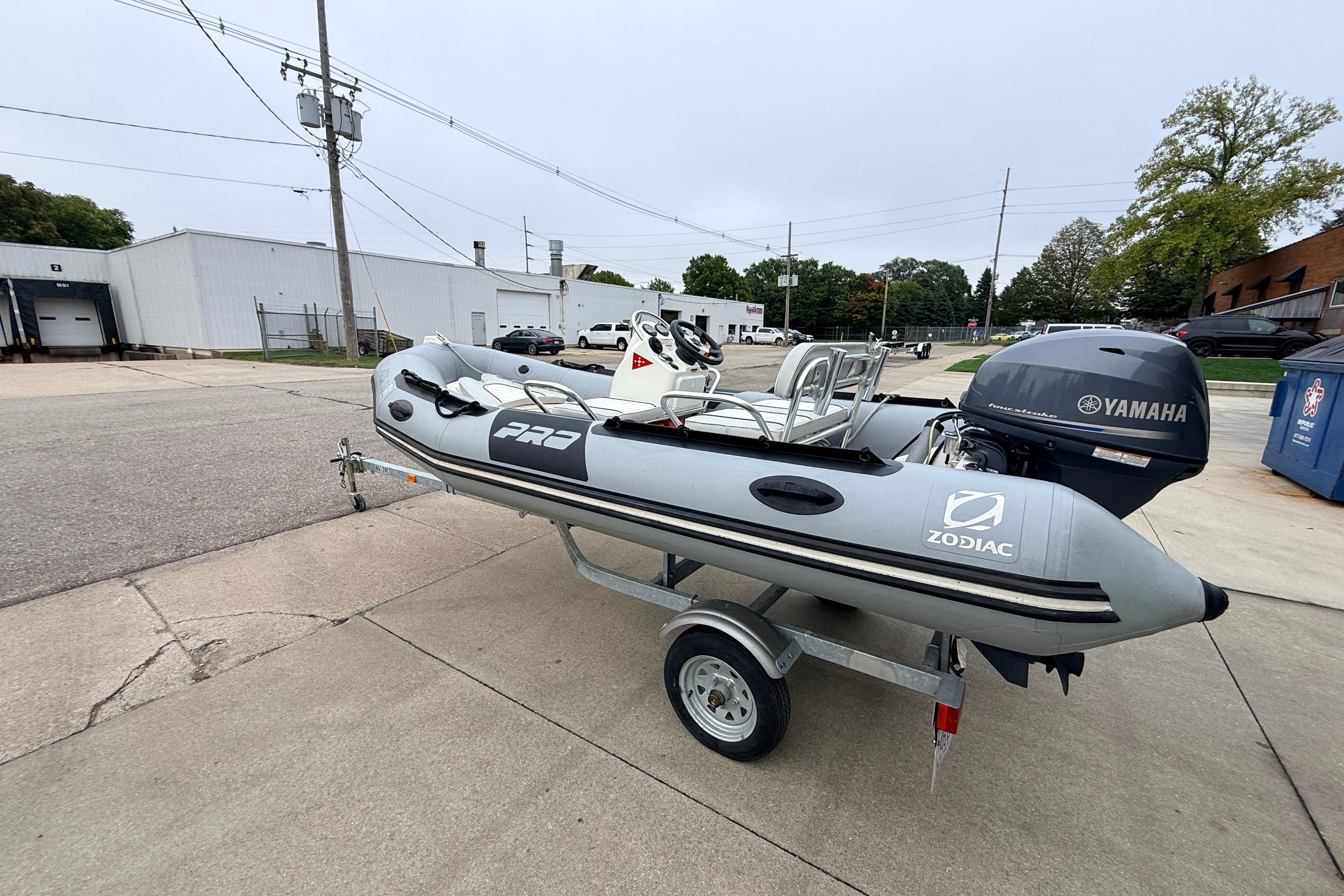 2014 Zodiac Pro Classic 420 inflatable boat on trailer with Yamaha outboard motor.