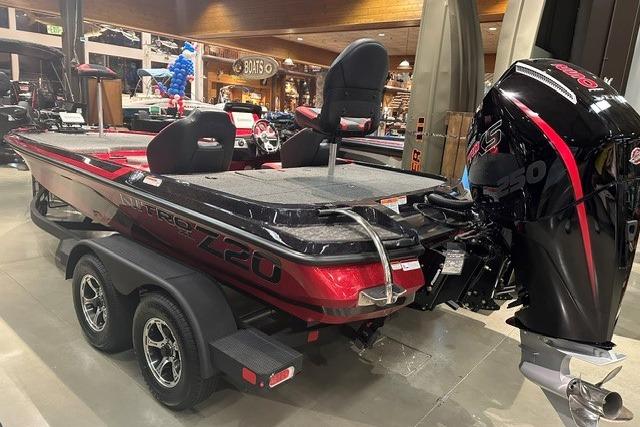 2026 Nitro Z20 XL Pro boat with powerful engine, showcased indoors on a trailer.