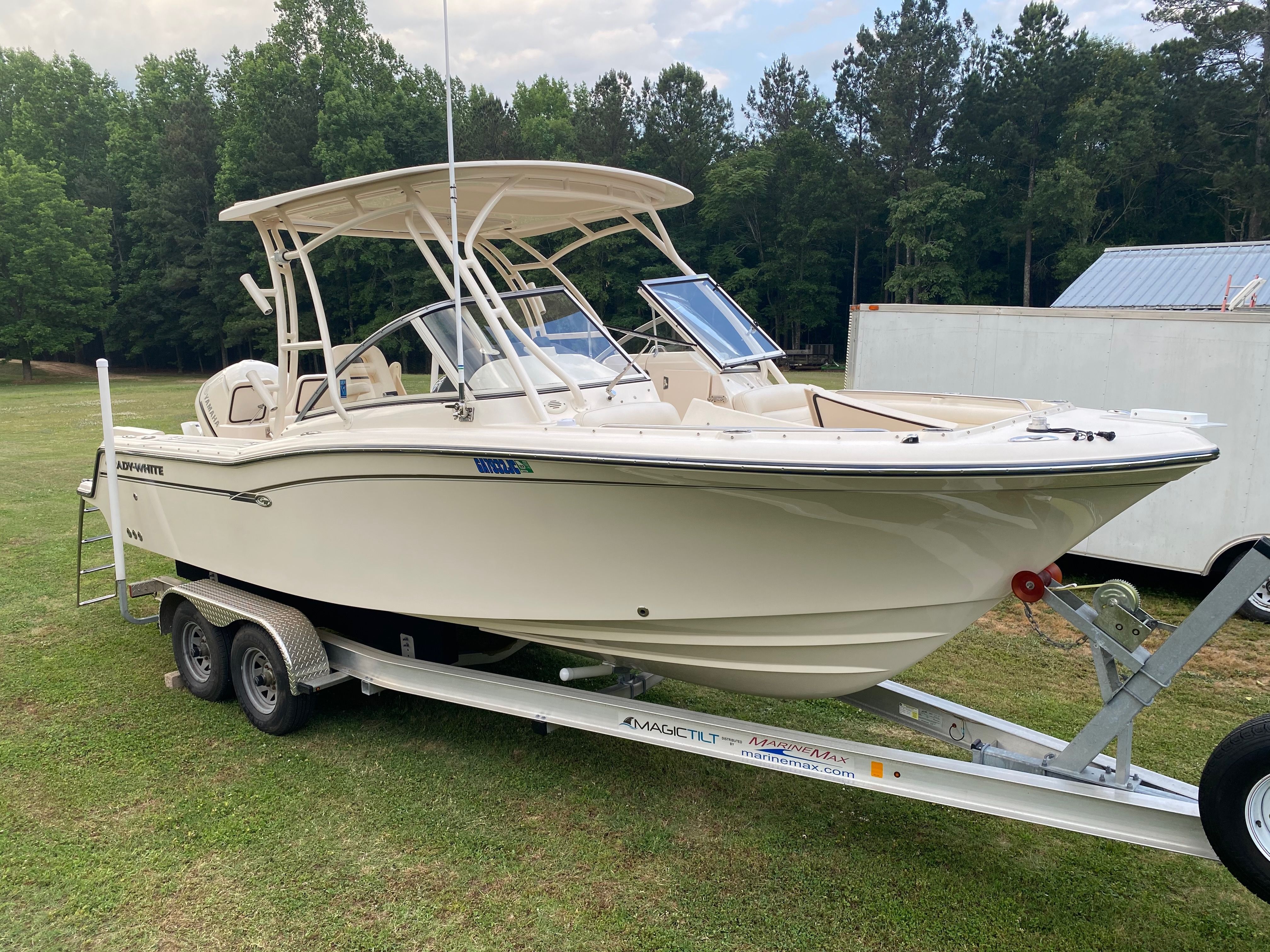 2018 Grady-White Freedom 235 boat on trailer outdoors.