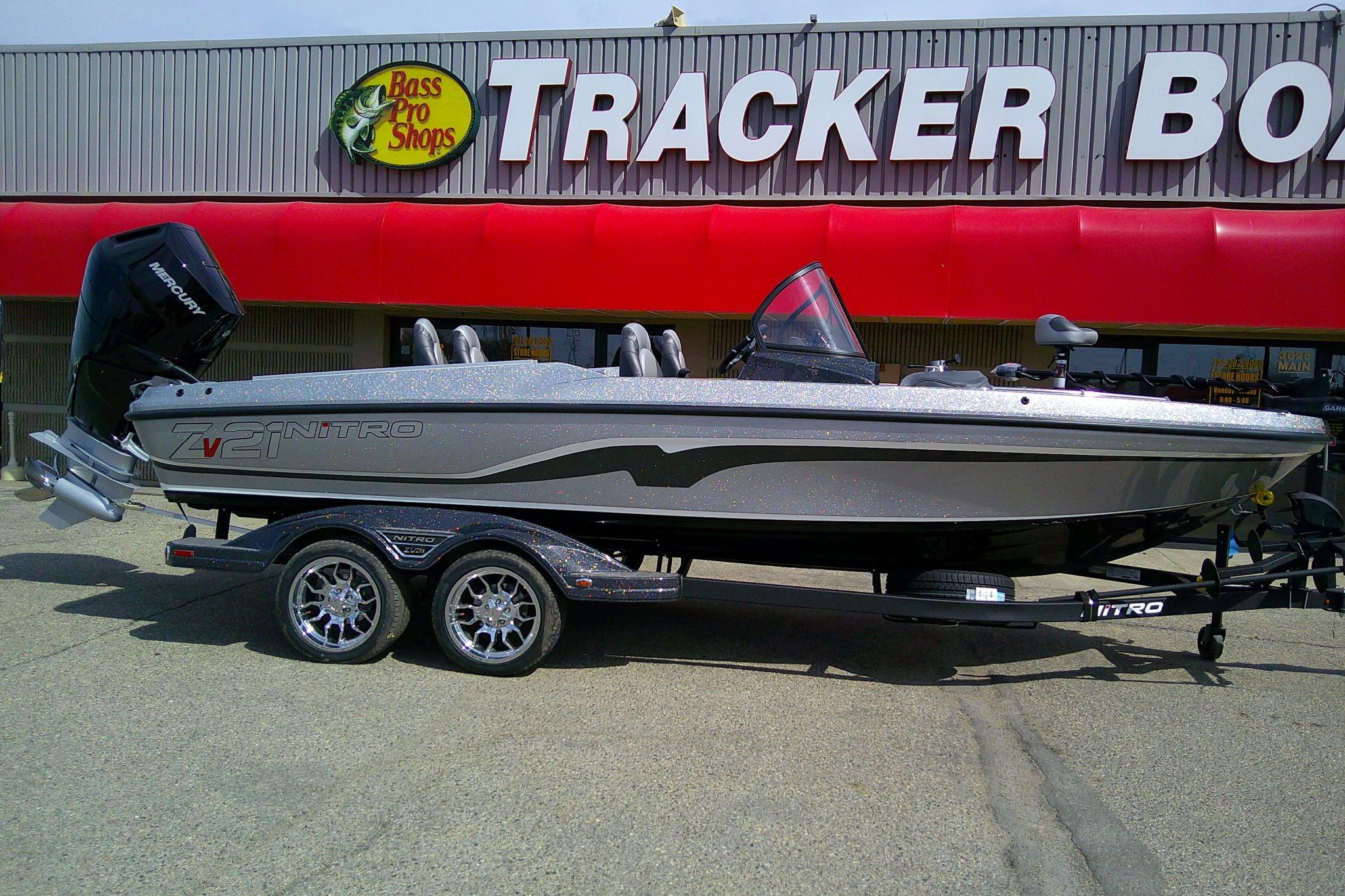 2026 Nitro ZV21 Pro boat displayed outside Bass Pro Shops Tracker Boats store.