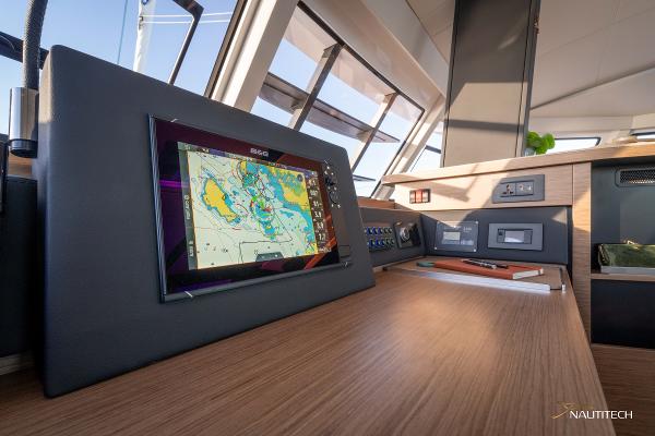 Nautitech 48 Open 2025 yacht interior with navigation system and modern controls.