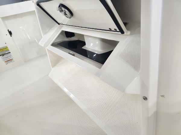2025 Pathfinder 2400 Open boat storage compartment with secure latch and sleek design.
