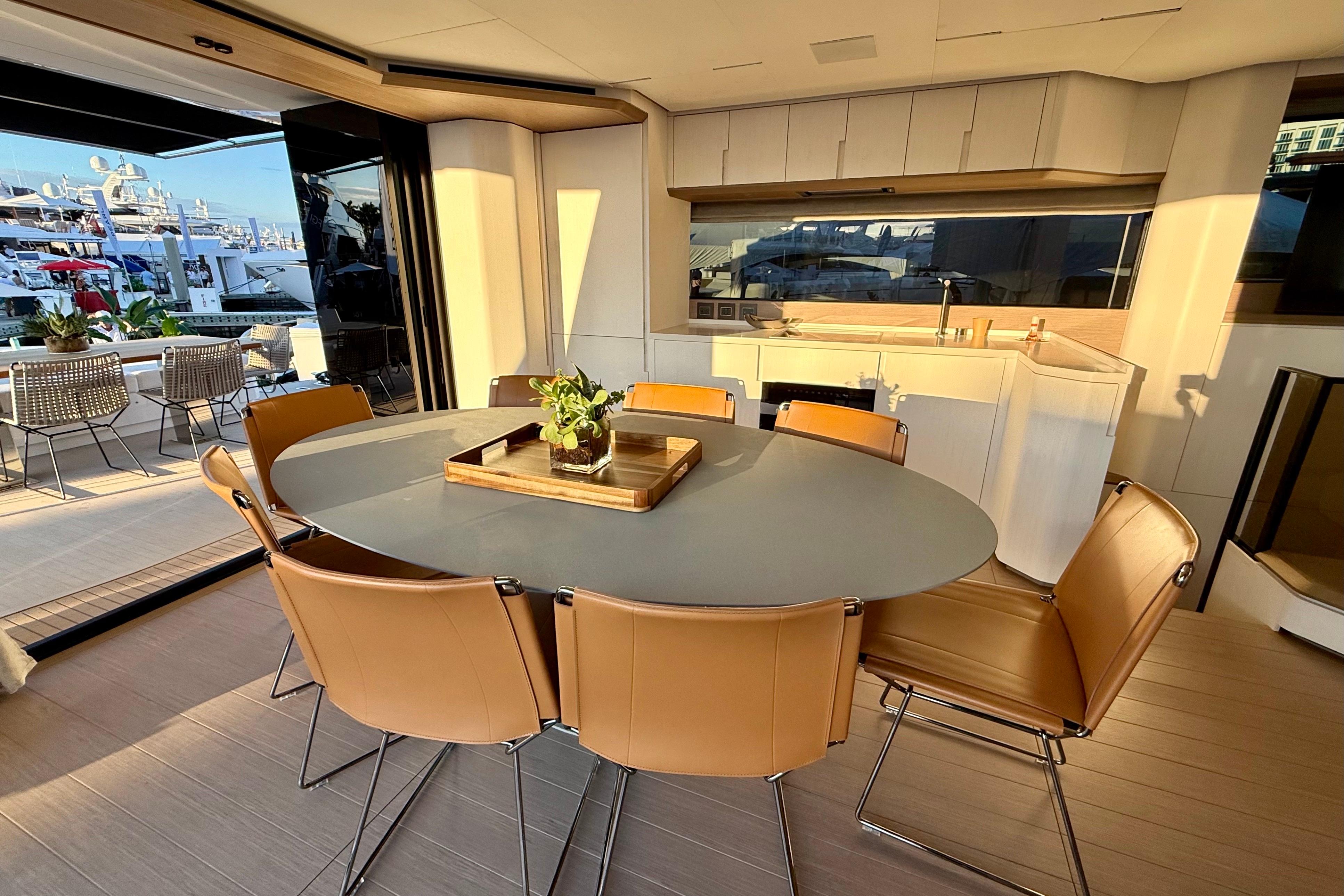 Luxurious interior of 2026 Pardo Yachts E72 with elegant dining area and modern kitchen.