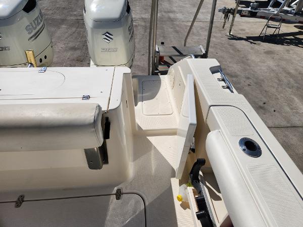 2005 Pursuit 3070 Offshore Center Console boat deck with Suzuki engines.