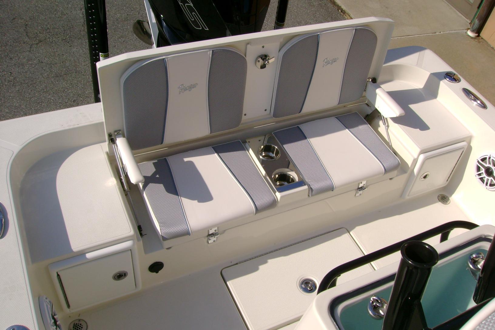 2026 Ranger 2360 Bay boat interior with cushioned seating and cup holders.