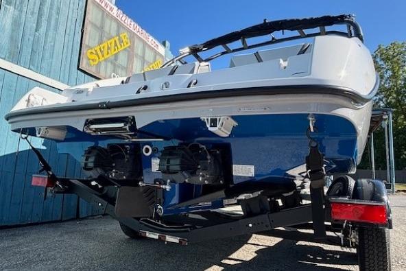 2026 Yamaha Boats AR220 on trailer, rear view, blue and white design.