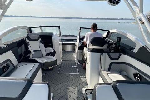 2021 Yamaha 275SD on calm water with luxurious, modern interior.