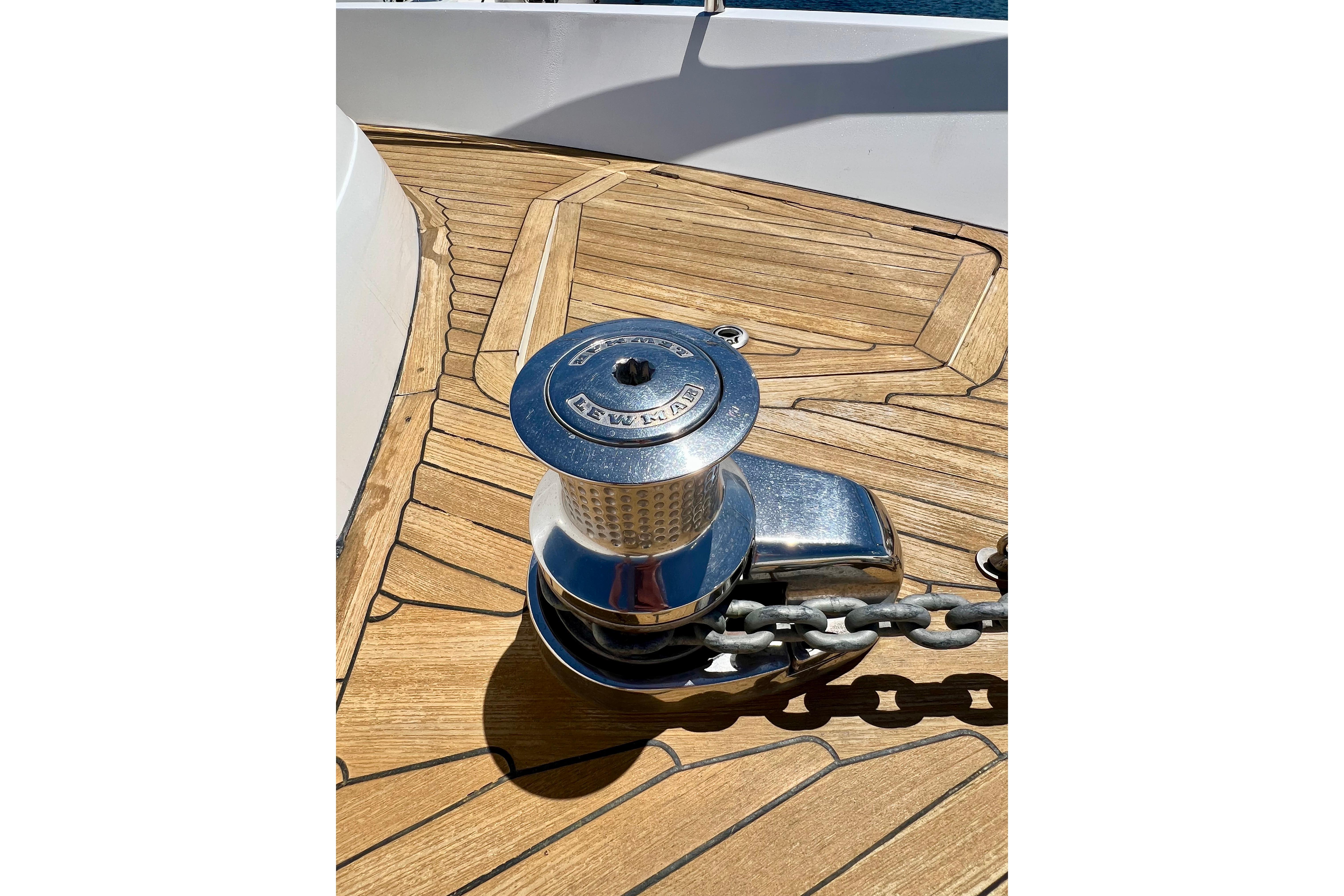 Anchor winch on teak deck of 2010 Princess V78 yacht.