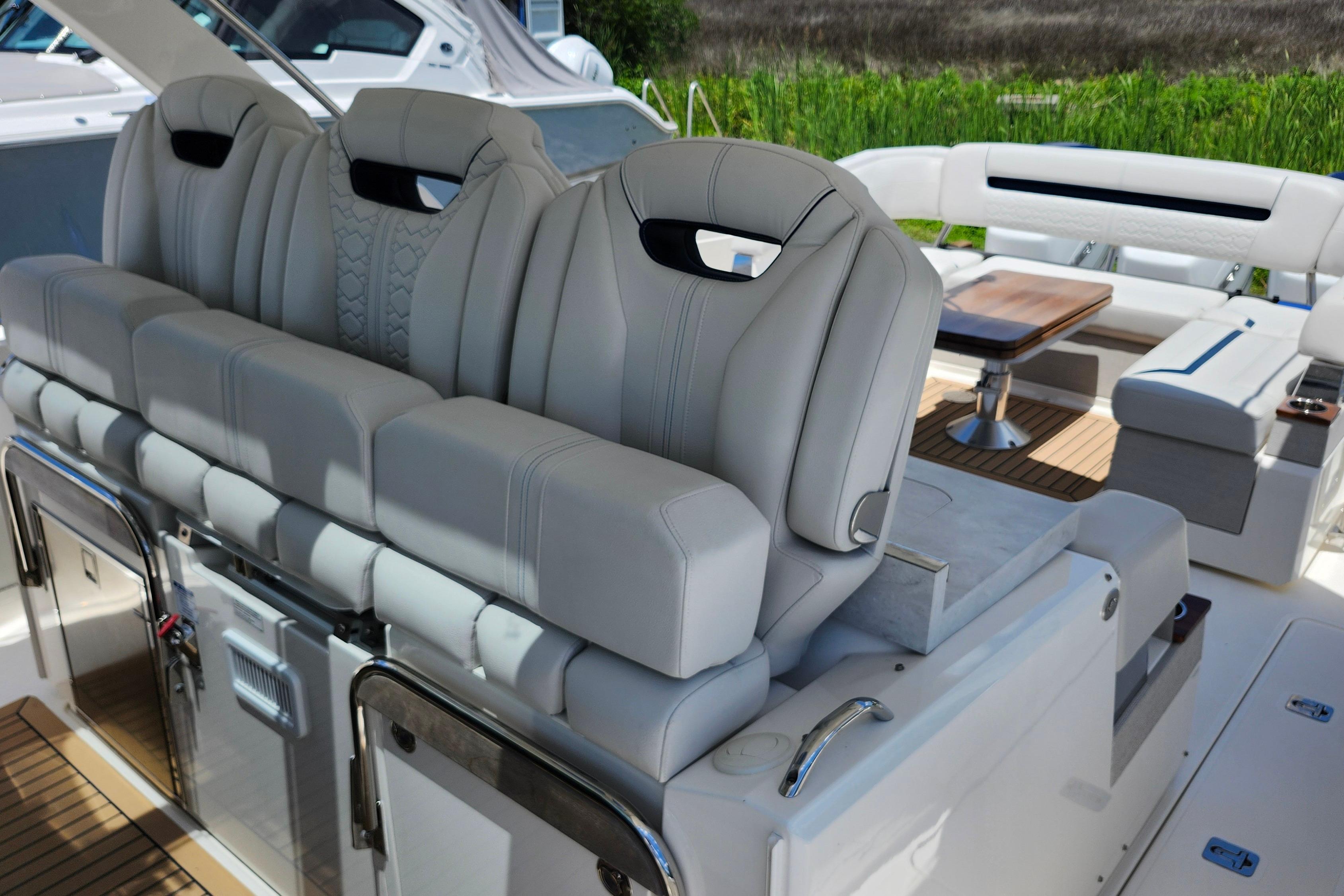 Luxurious seating on 2022 Tiara Yachts 38 LS, featuring elegant design and comfort.