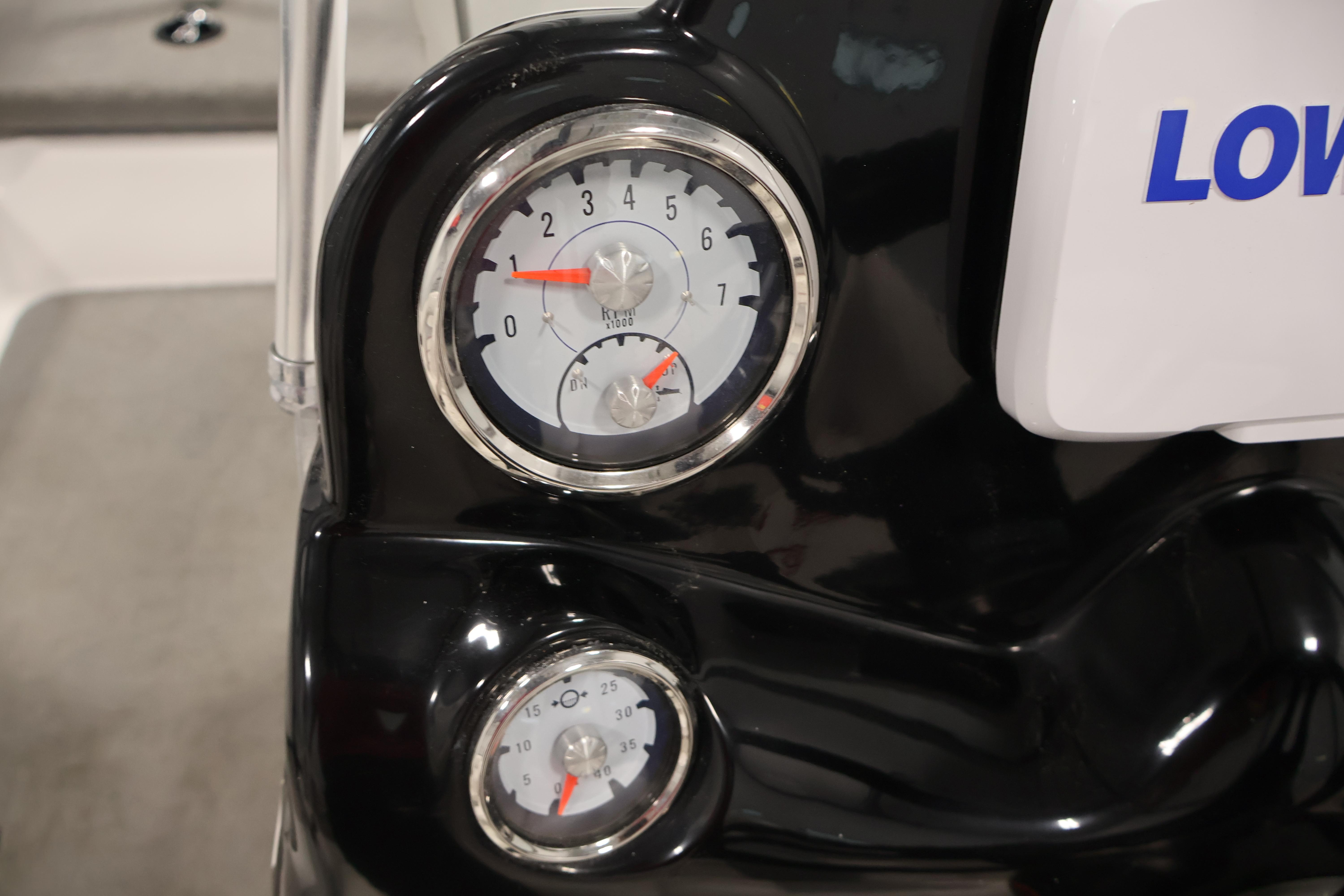 Close-up of 2019 Nitro Z19 Sport boat gauges, displaying RPM and speed indicators.
