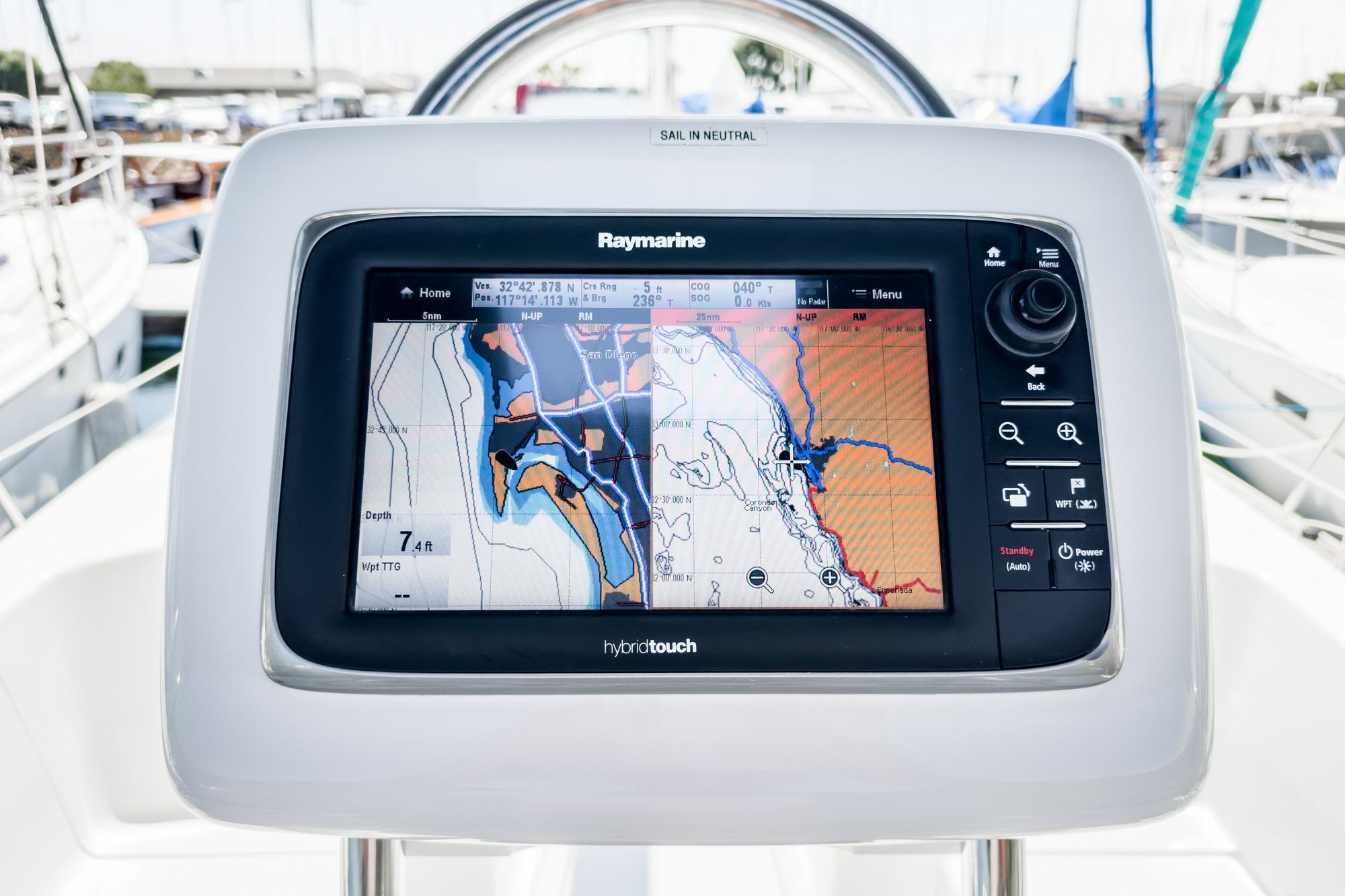 Raymarine navigation system on 2015 Hunter 33 sailboat, displaying nautical chart.