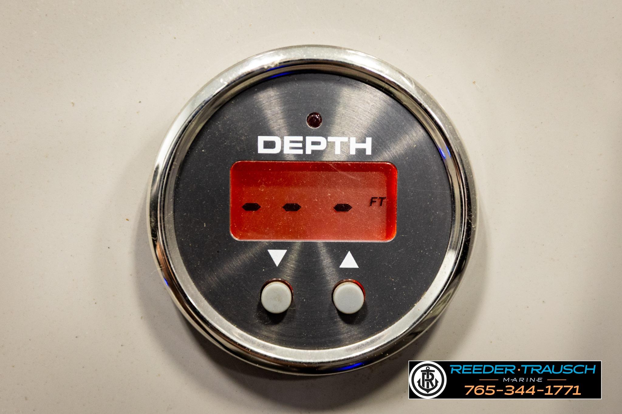 Depth gauge on a 2019 Manitou Oasis SR VP boat dashboard.