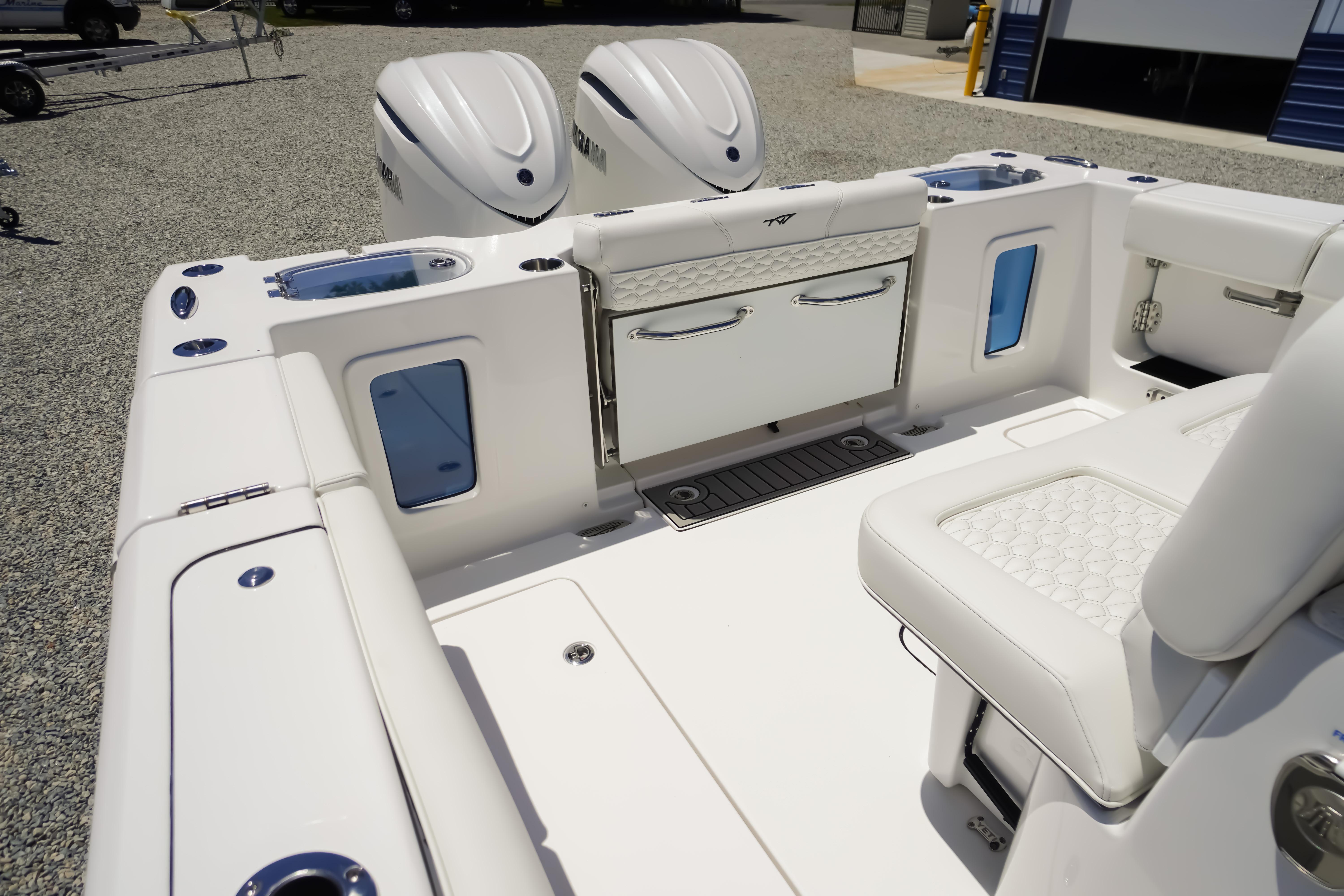 2026 Tidewater 302 CC Adventure boat interior with dual engines and luxurious seating.