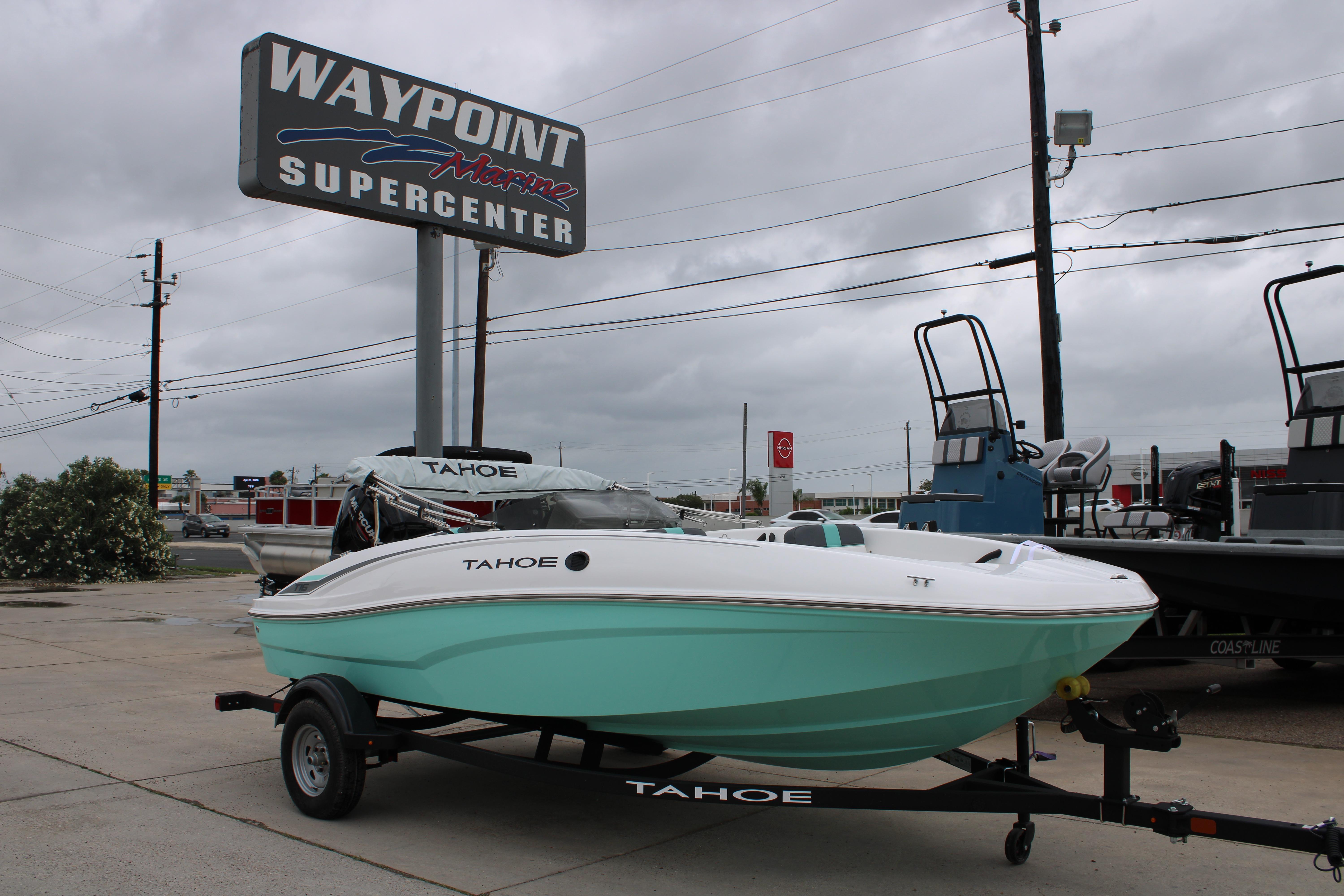 2026 Tahoe T16 boat displayed at Waypoint Marine Supercenter under cloudy skies.