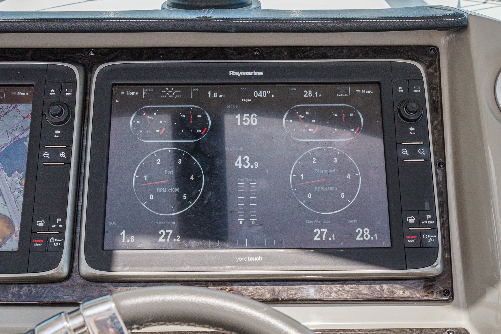 Dashboard of 2014 Sea Ray 540 Sundancer with Raymarine navigation display.