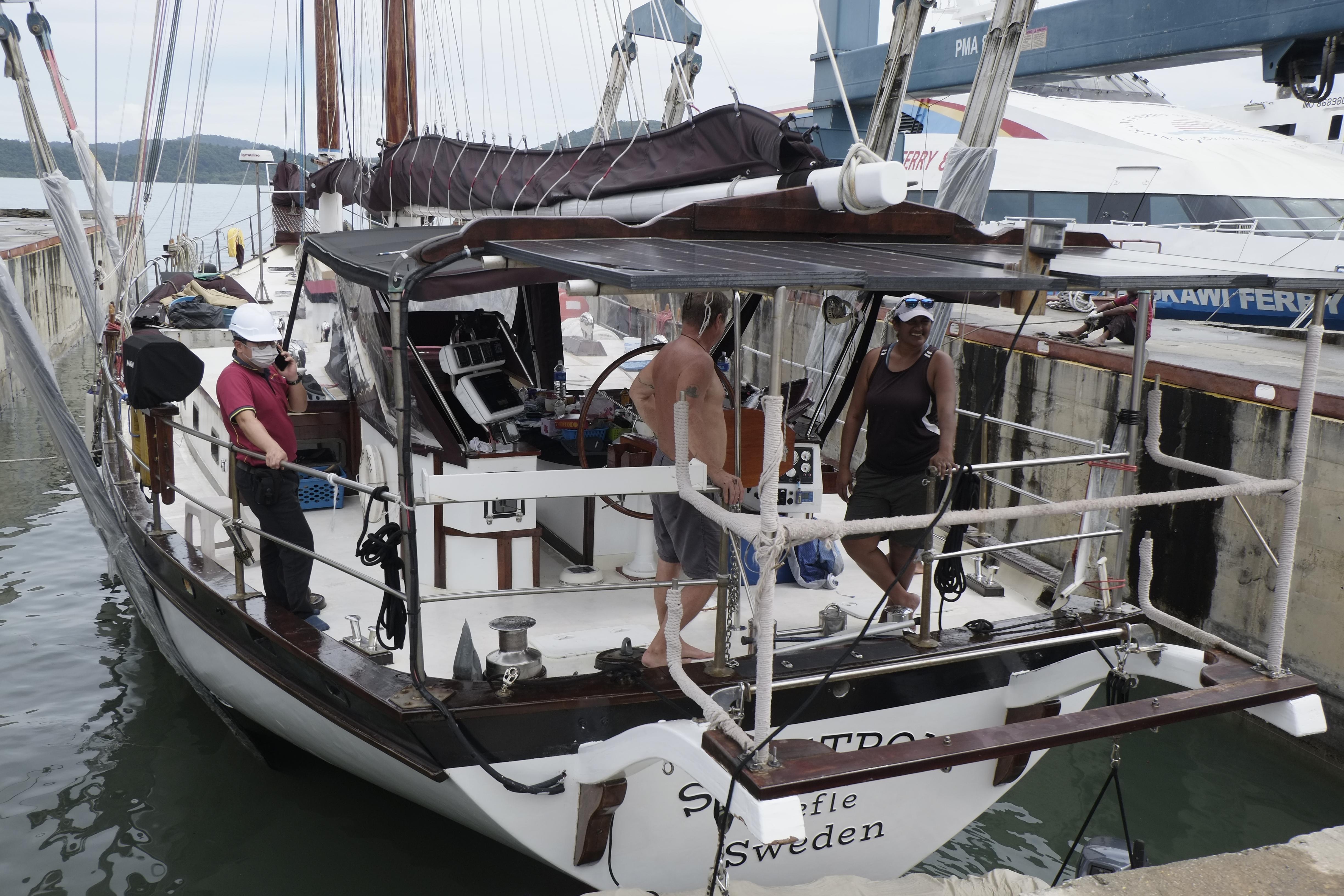 Custom Bud Macintosh schooner, 2006, docked with people on deck, featuring Swedish registration.