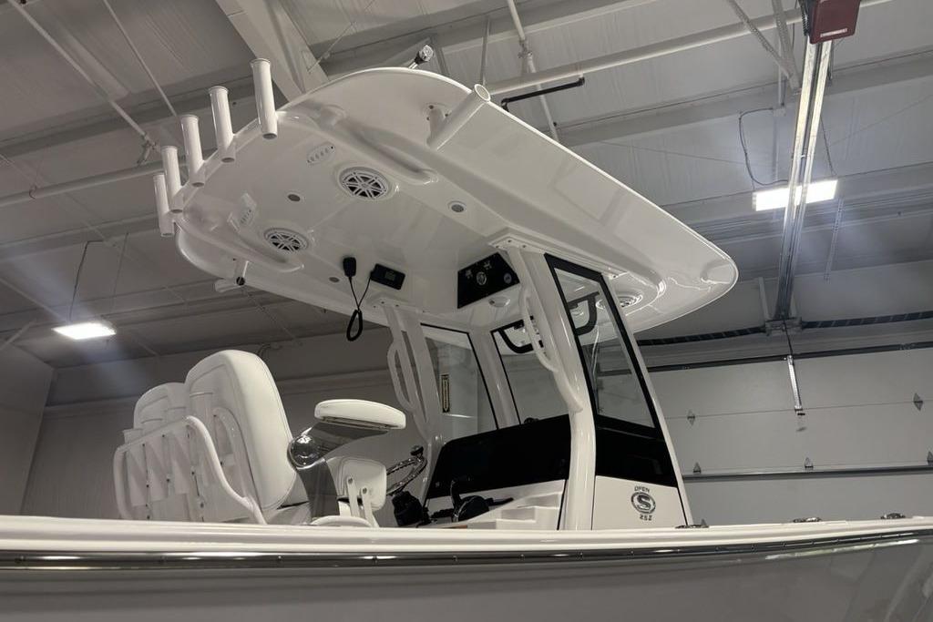 2026 Sportsman Open 252 Center Console boat interior in a showroom setting.